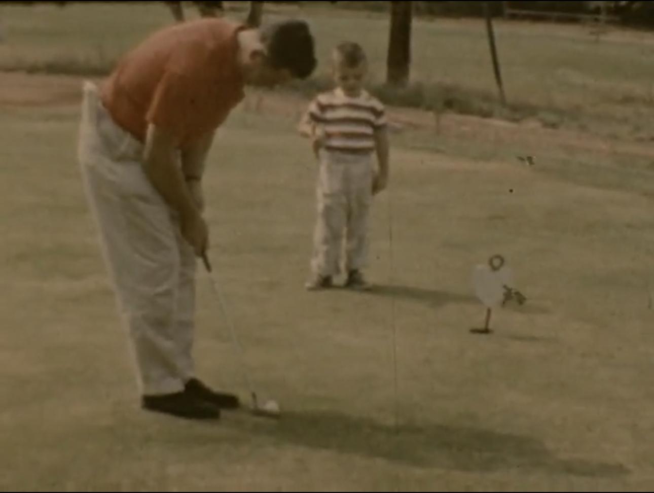 Bill learning golf with his d…