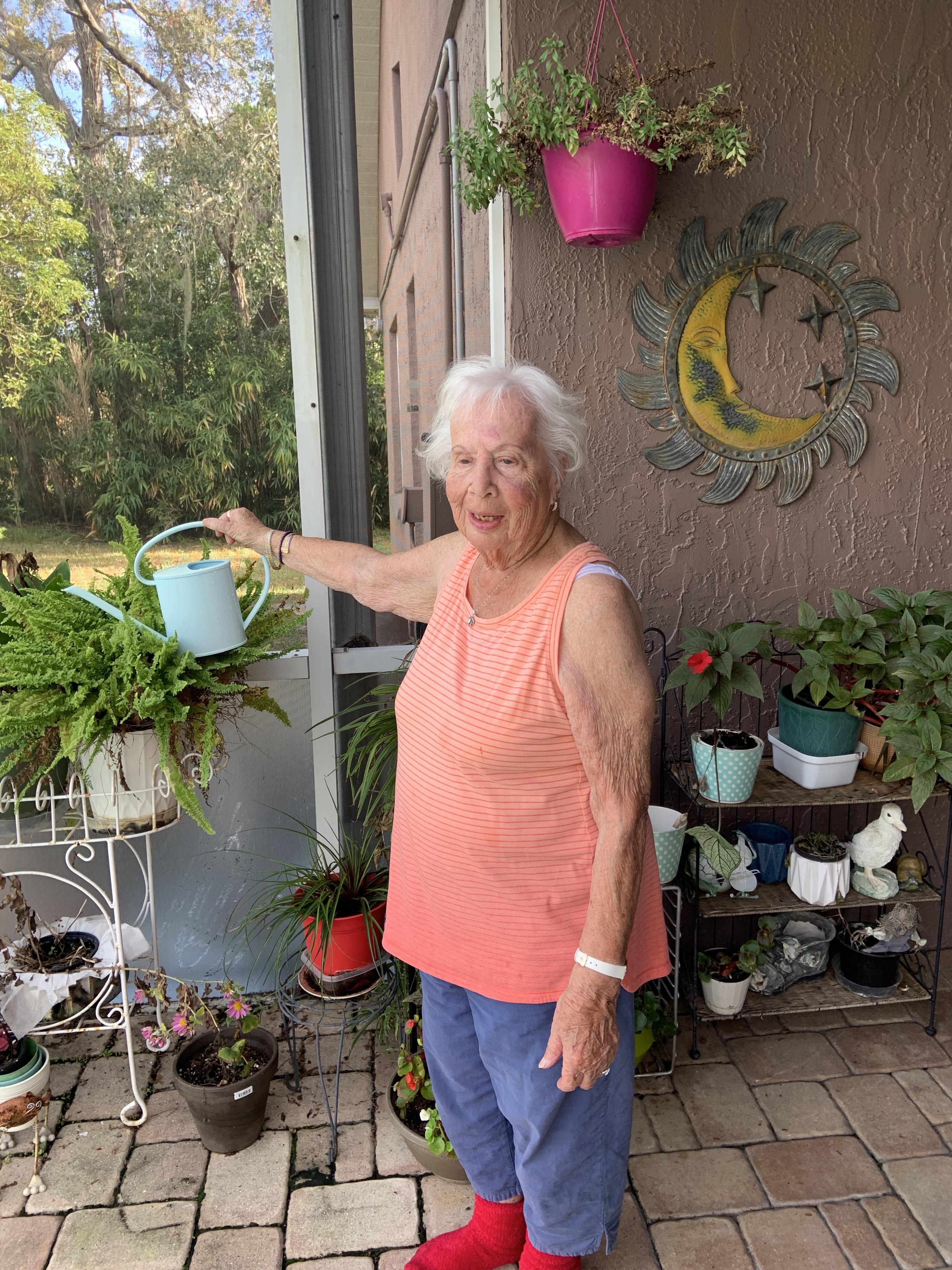 Mom enjoying flowers on my la…