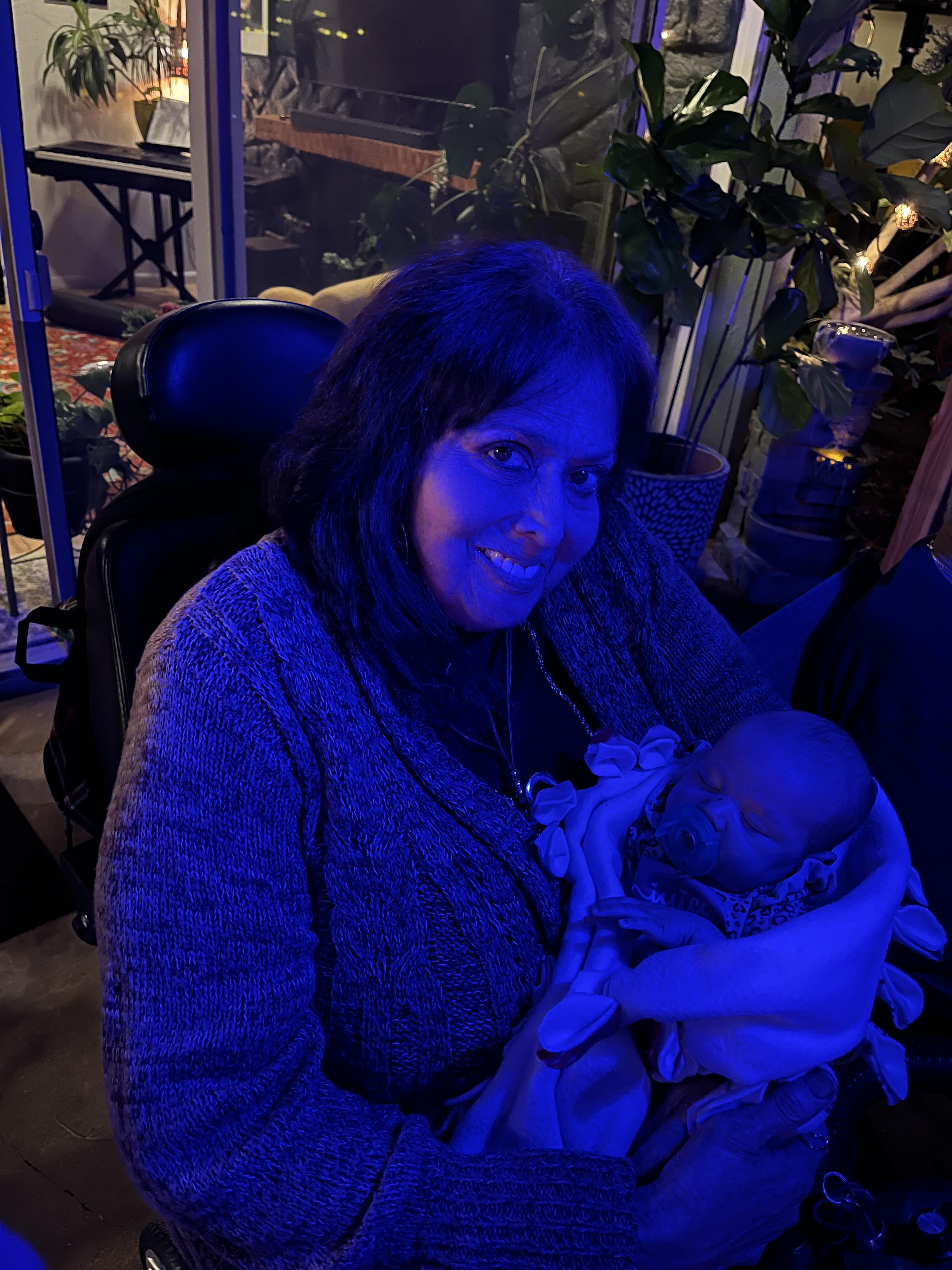 Yvonne holding my daughter, E…