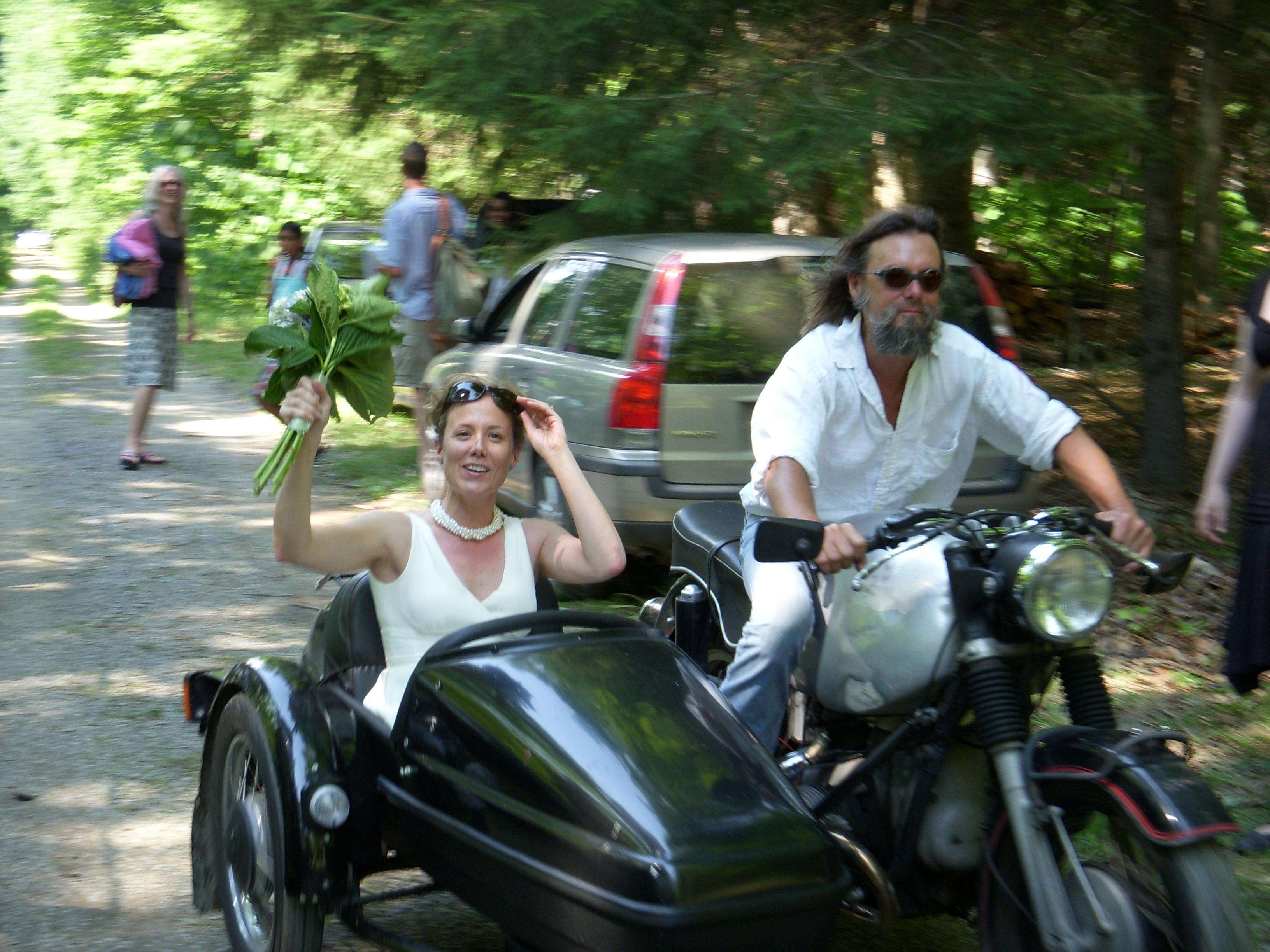 Catherine riding sidecar with…