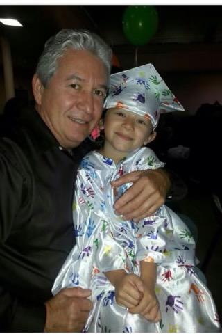 Gilbert with his granddaughter
