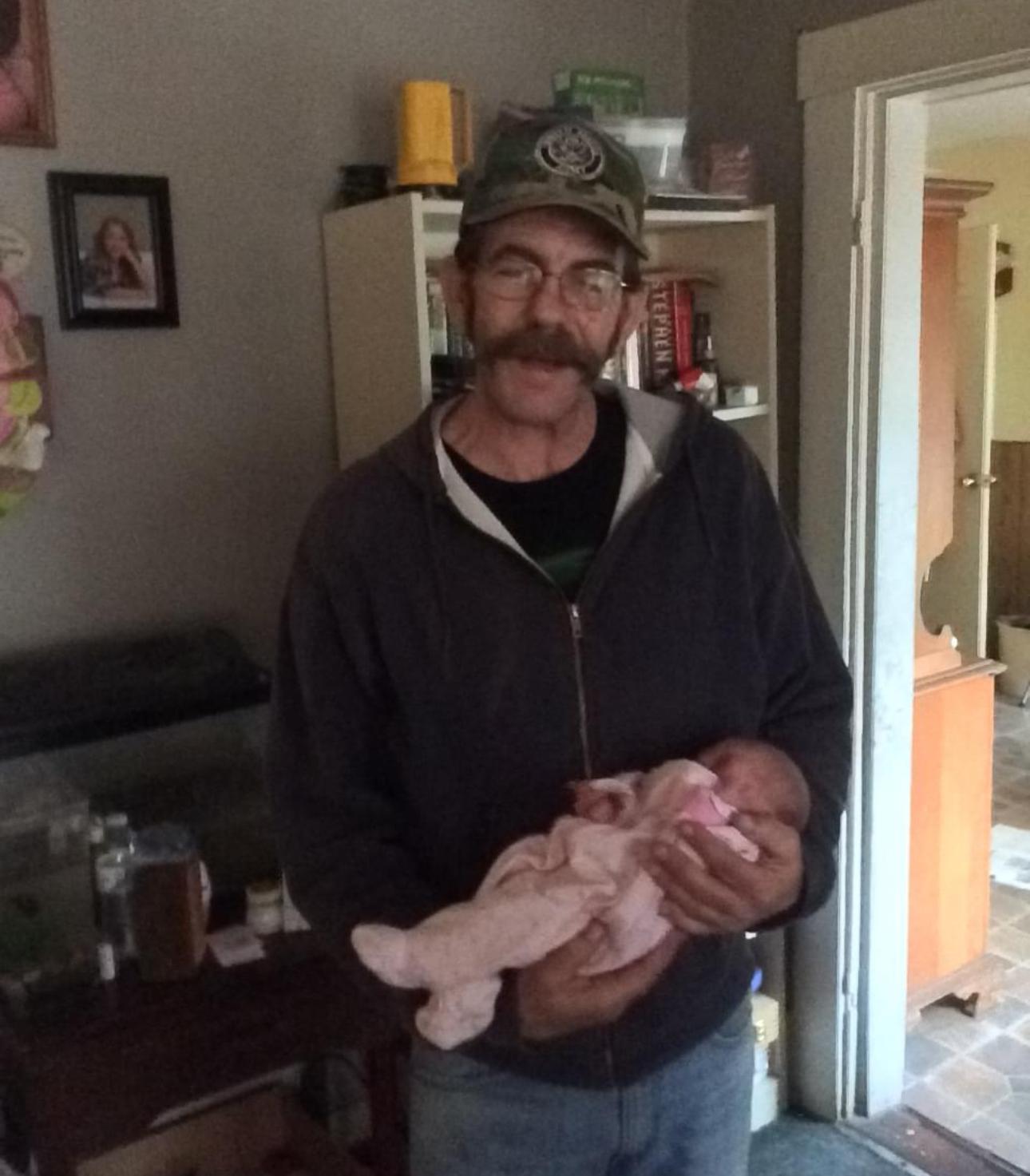 Papas first time holding Hayl…