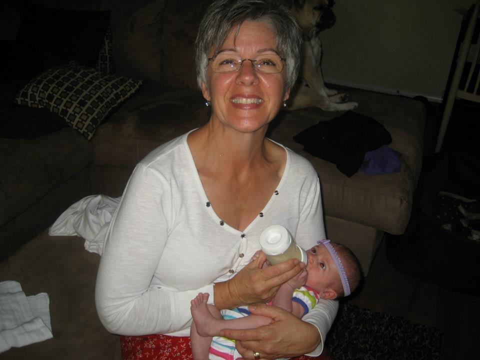 Carla holding her granddaught…