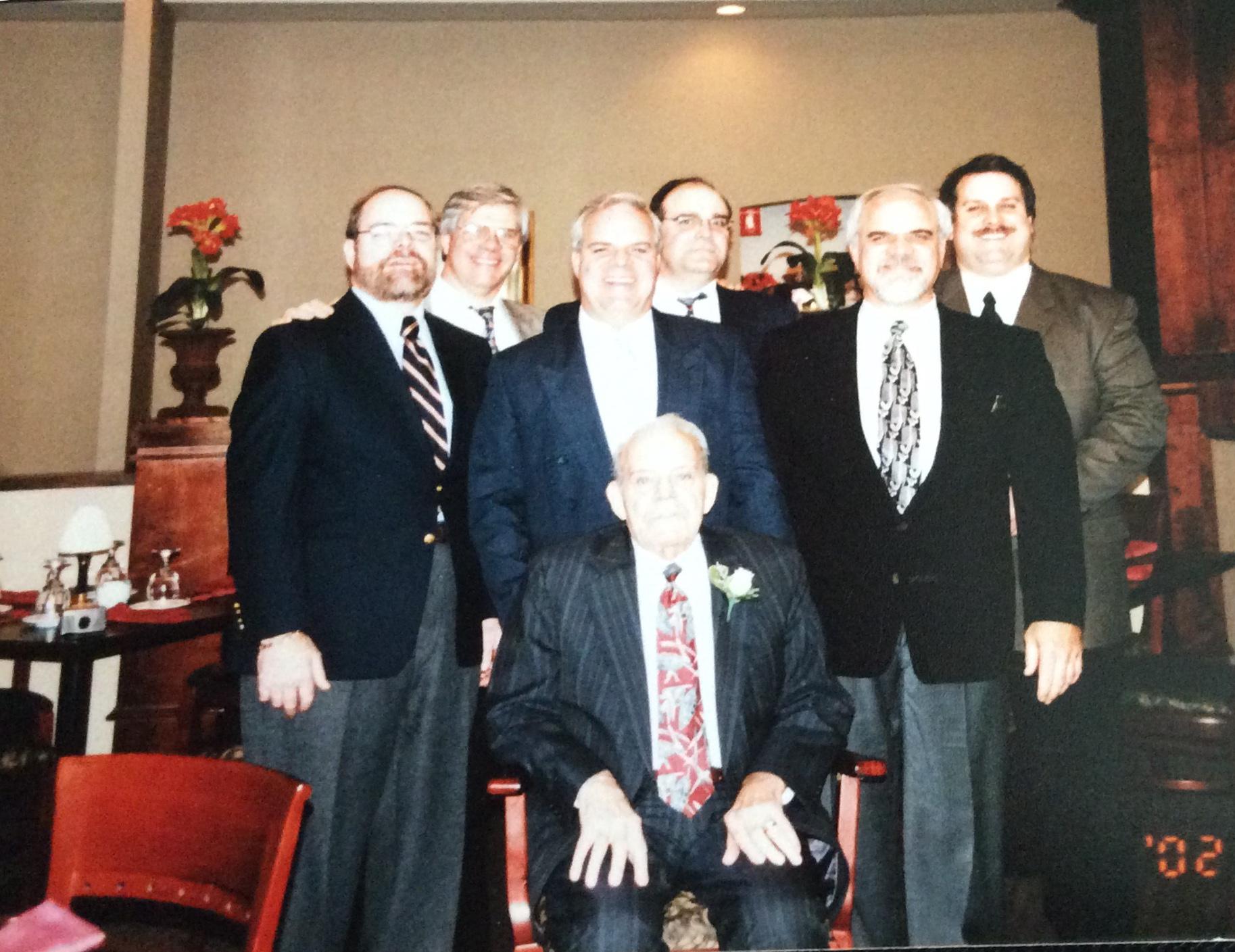 Dennis with his dad and 5 bro…