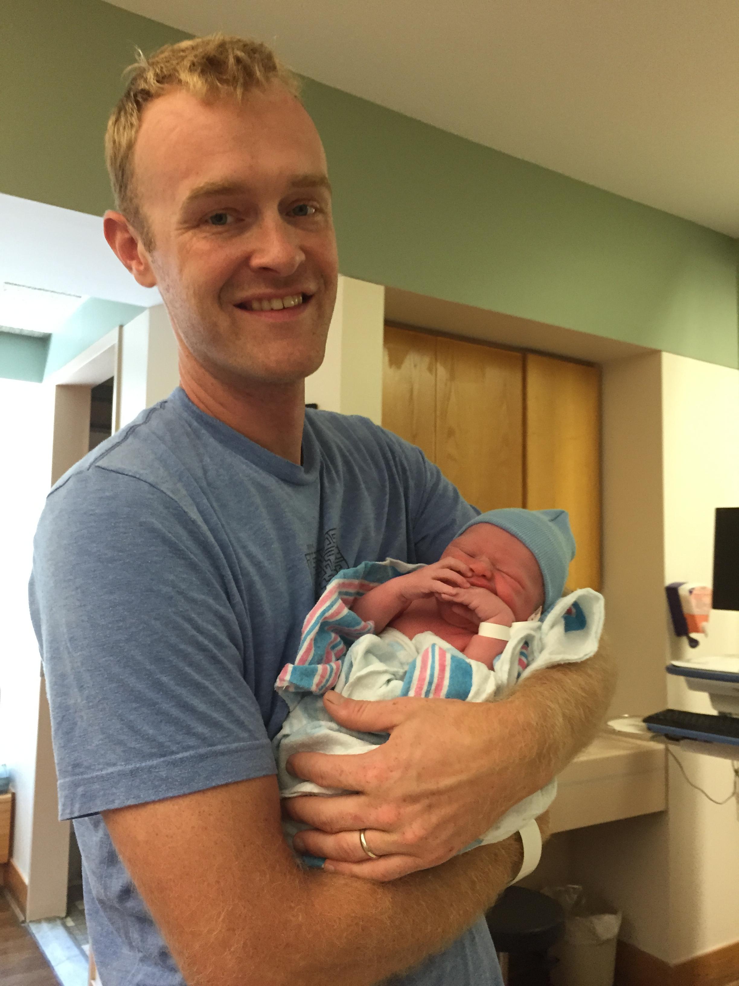 Bryan with new baby Alden