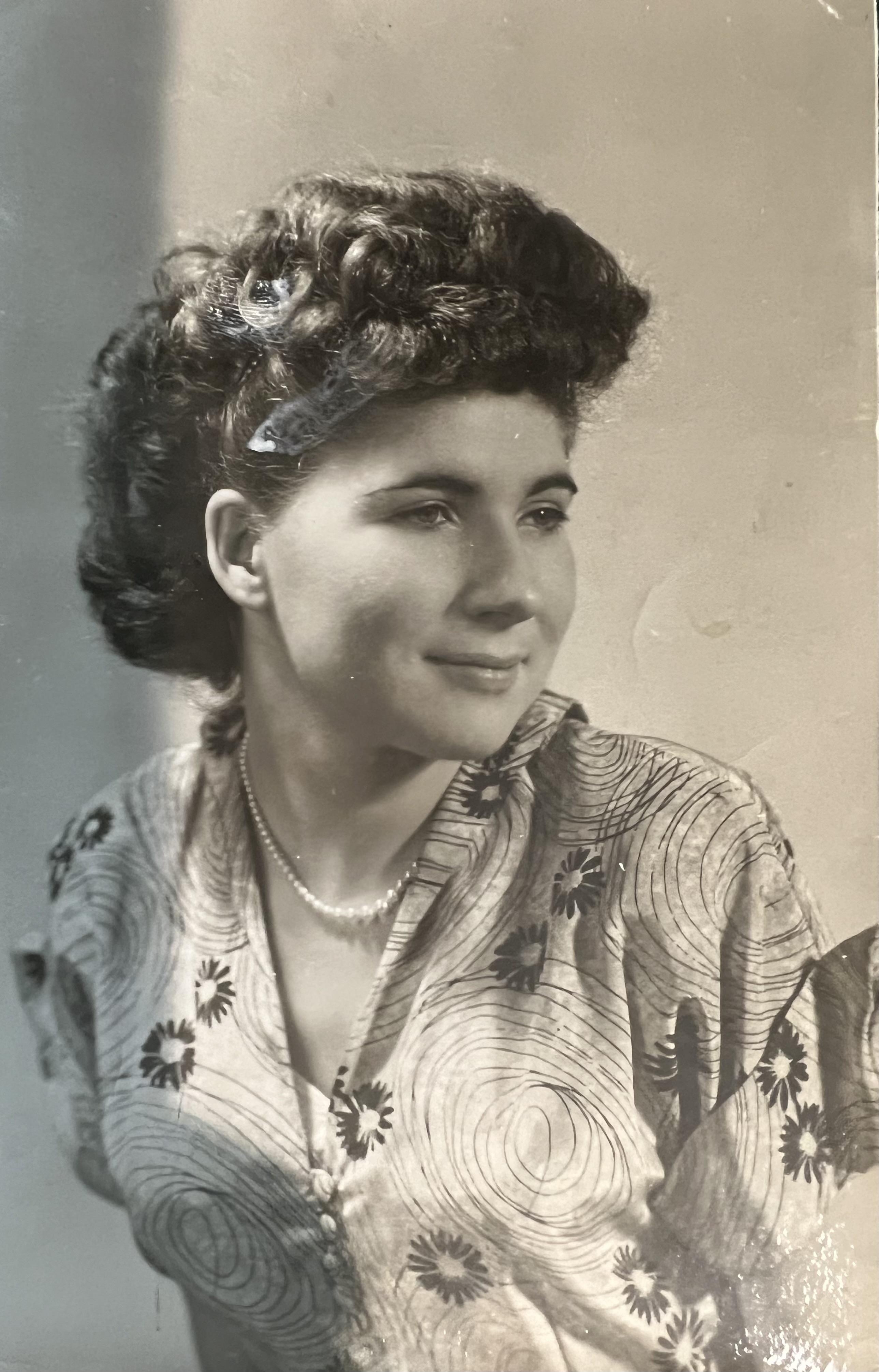 My mom in her early twenties,…