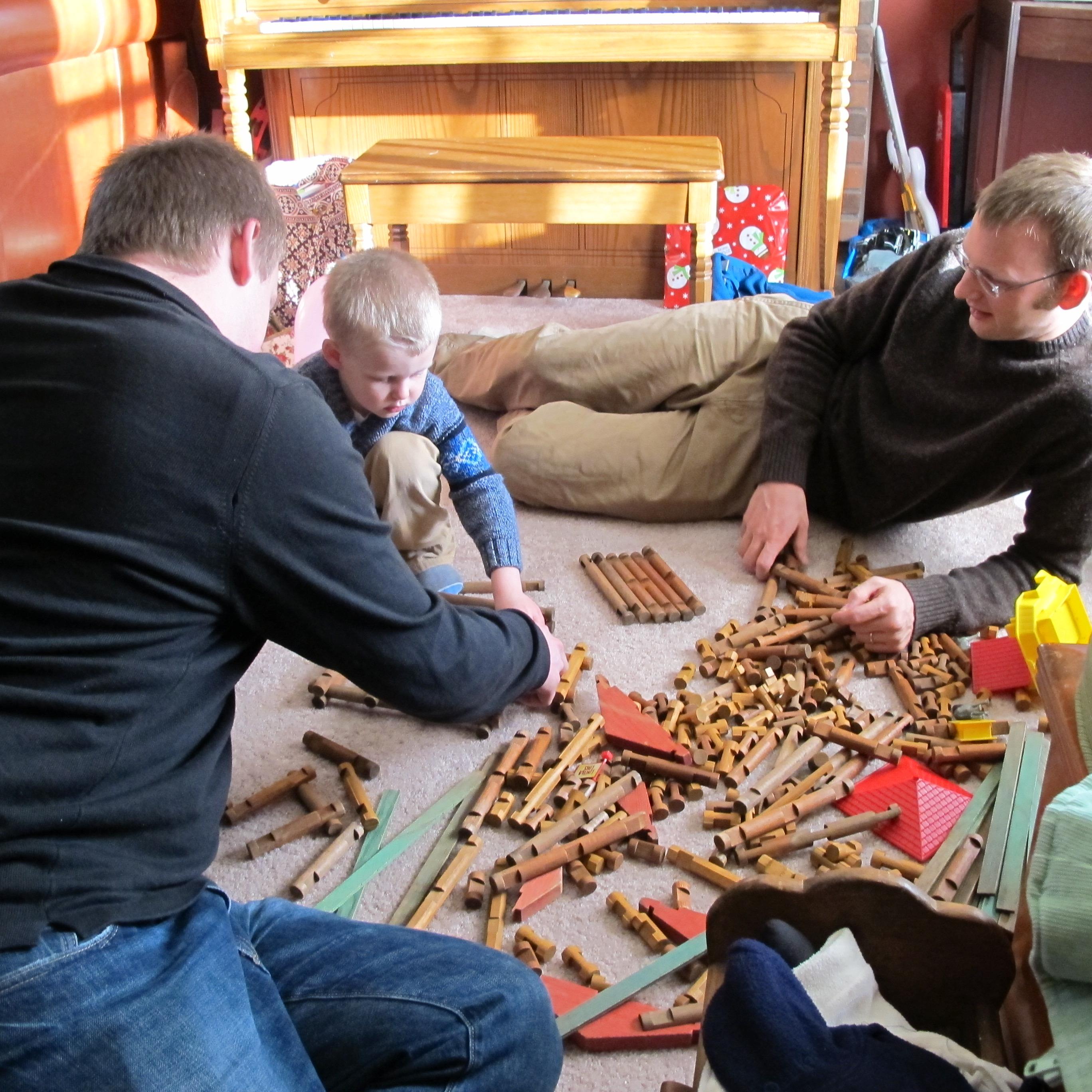 Micah playing Lincoln Logs wi…