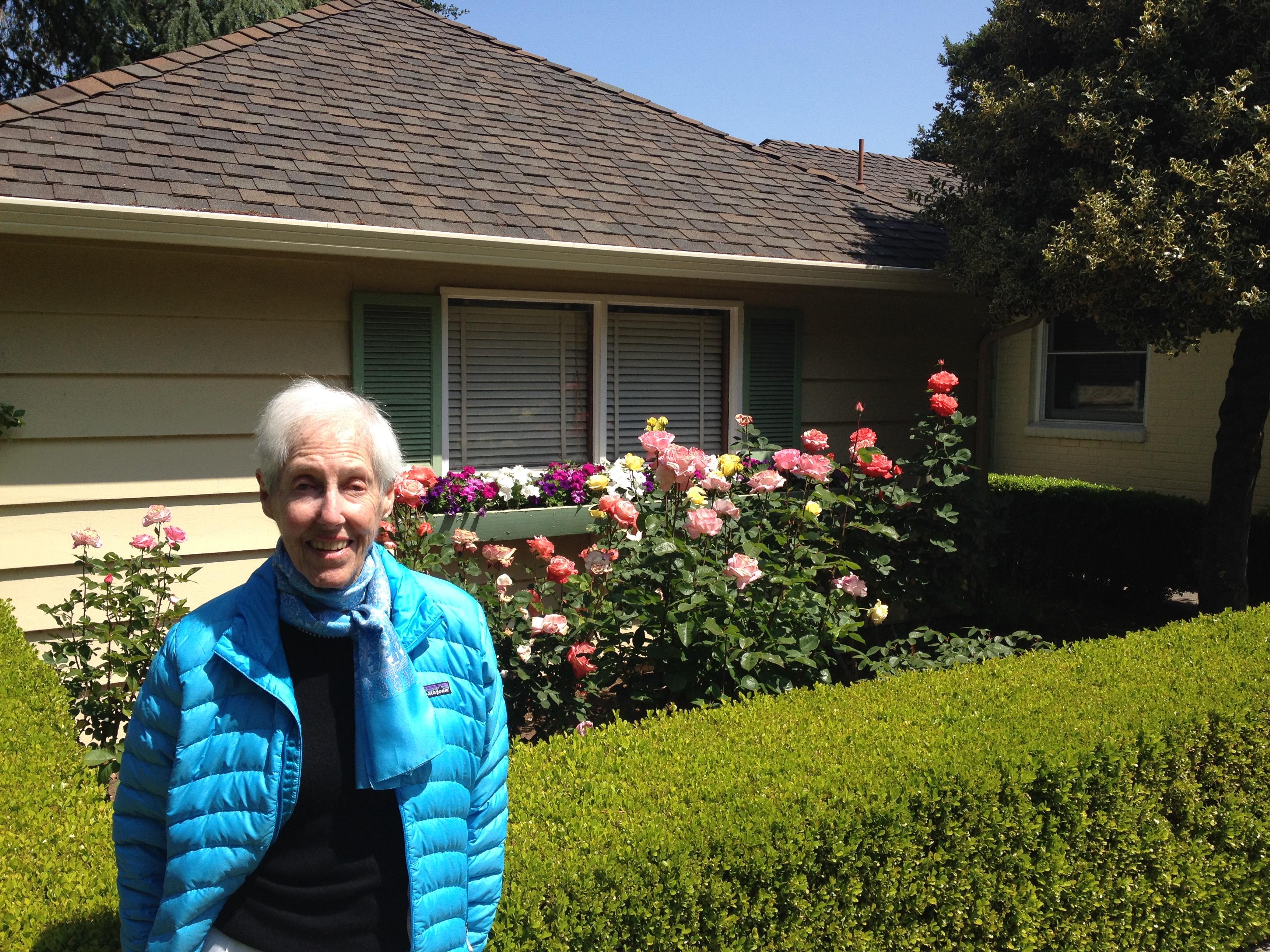 Nancy and her beloved roses.