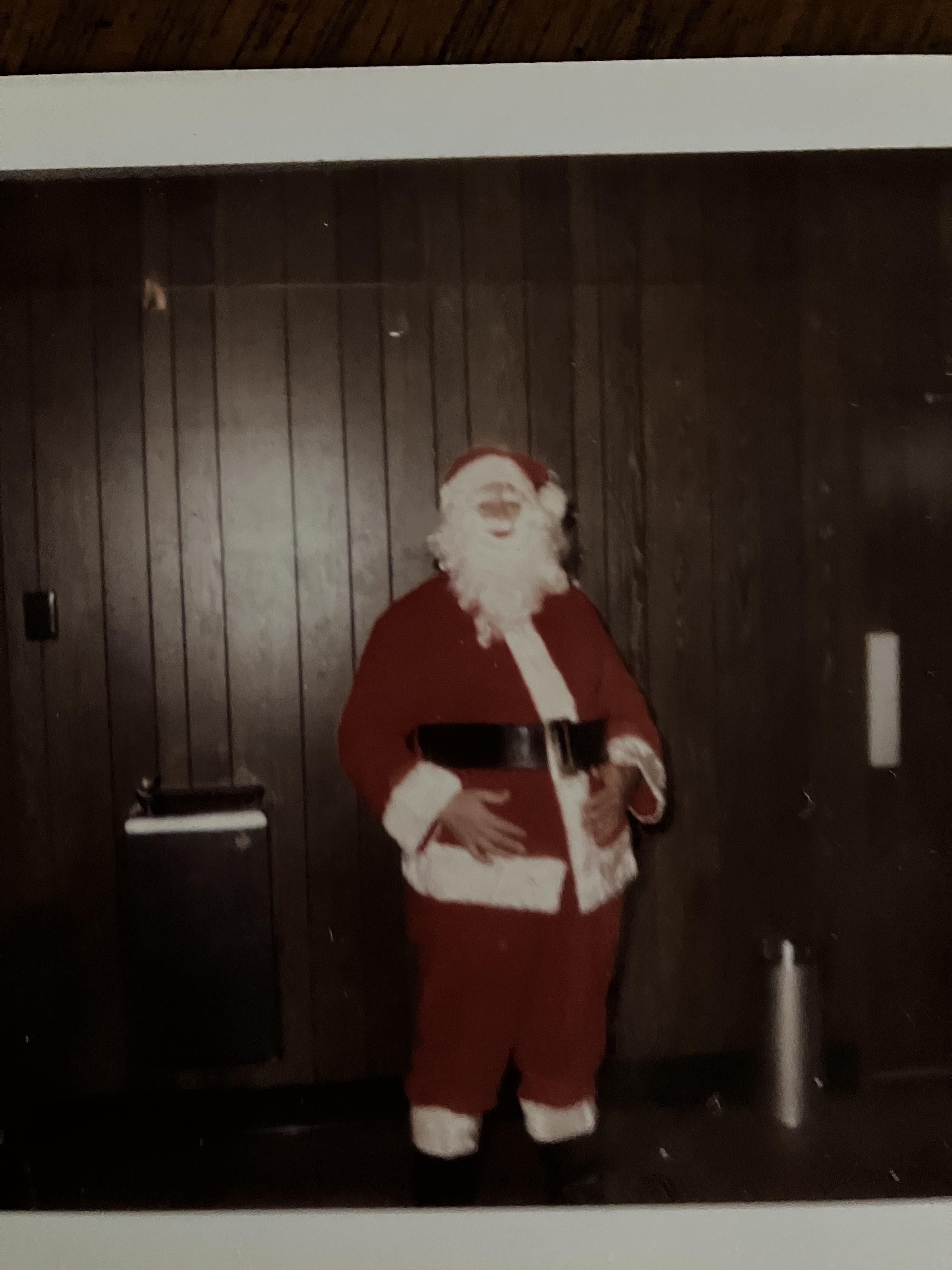 Mickey playing Santa Claus