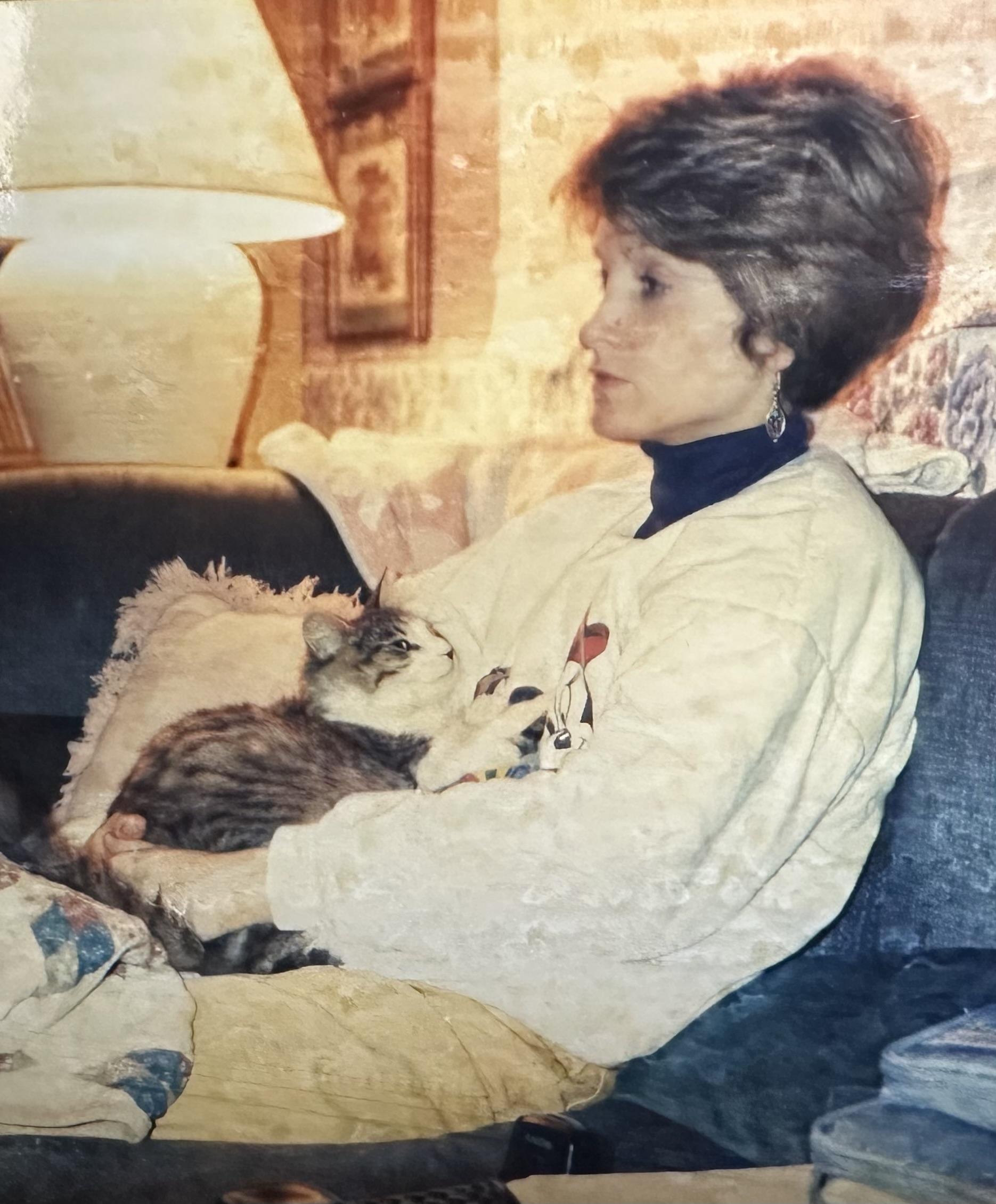 Amy with one of her beloved c…