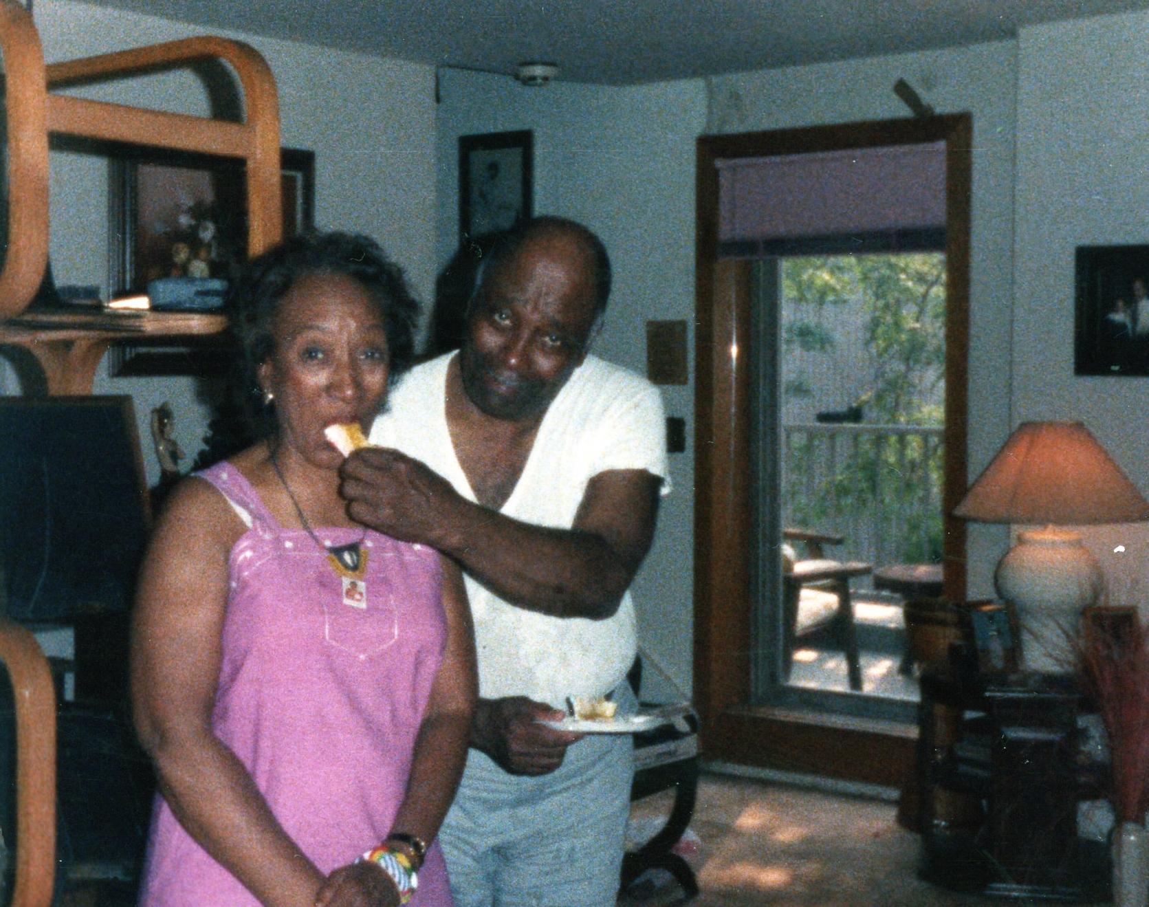 Enjoying anniversary cake