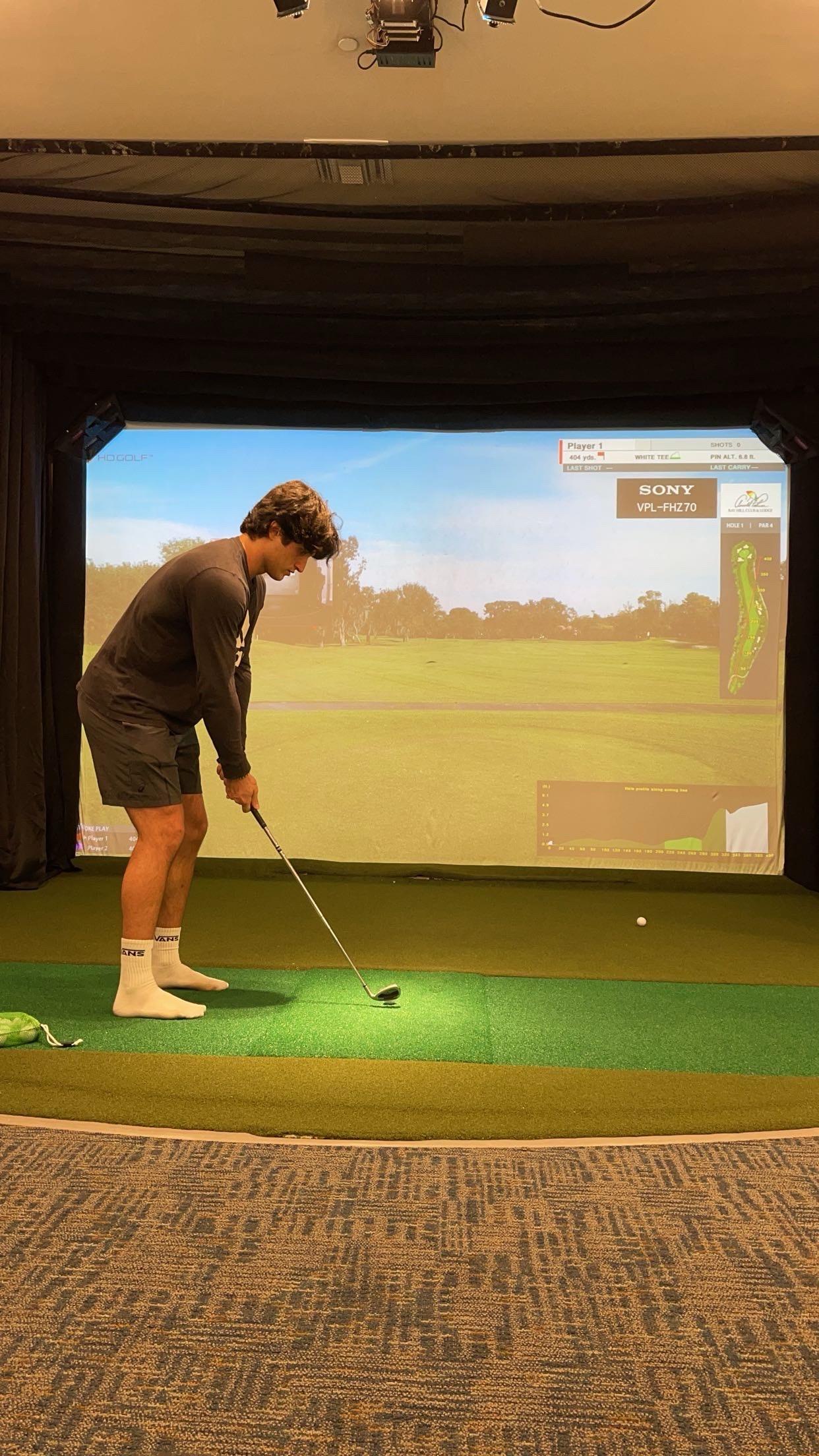 Testing out the indoor golf r…