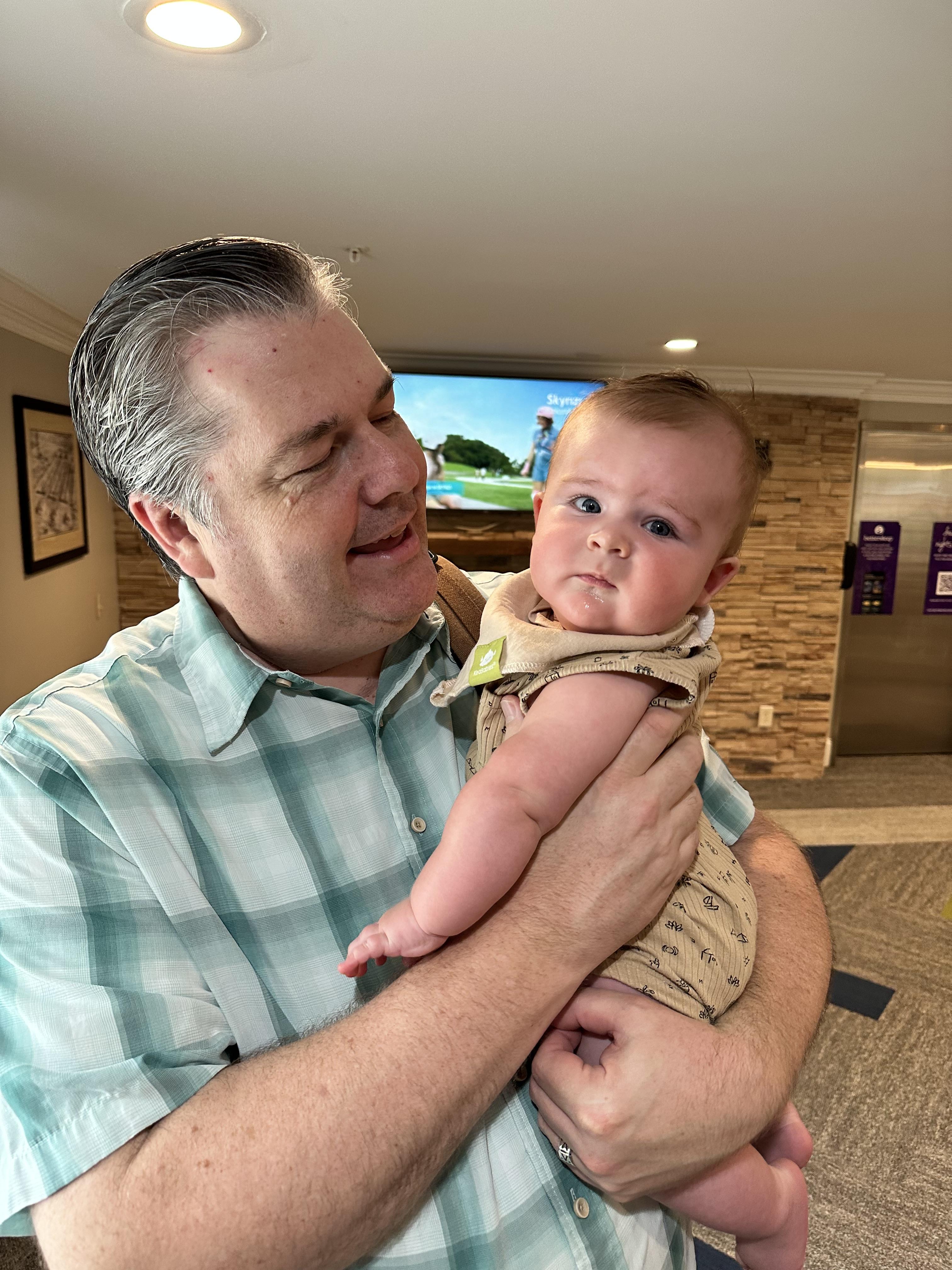 Normal sized baby with Uncle …