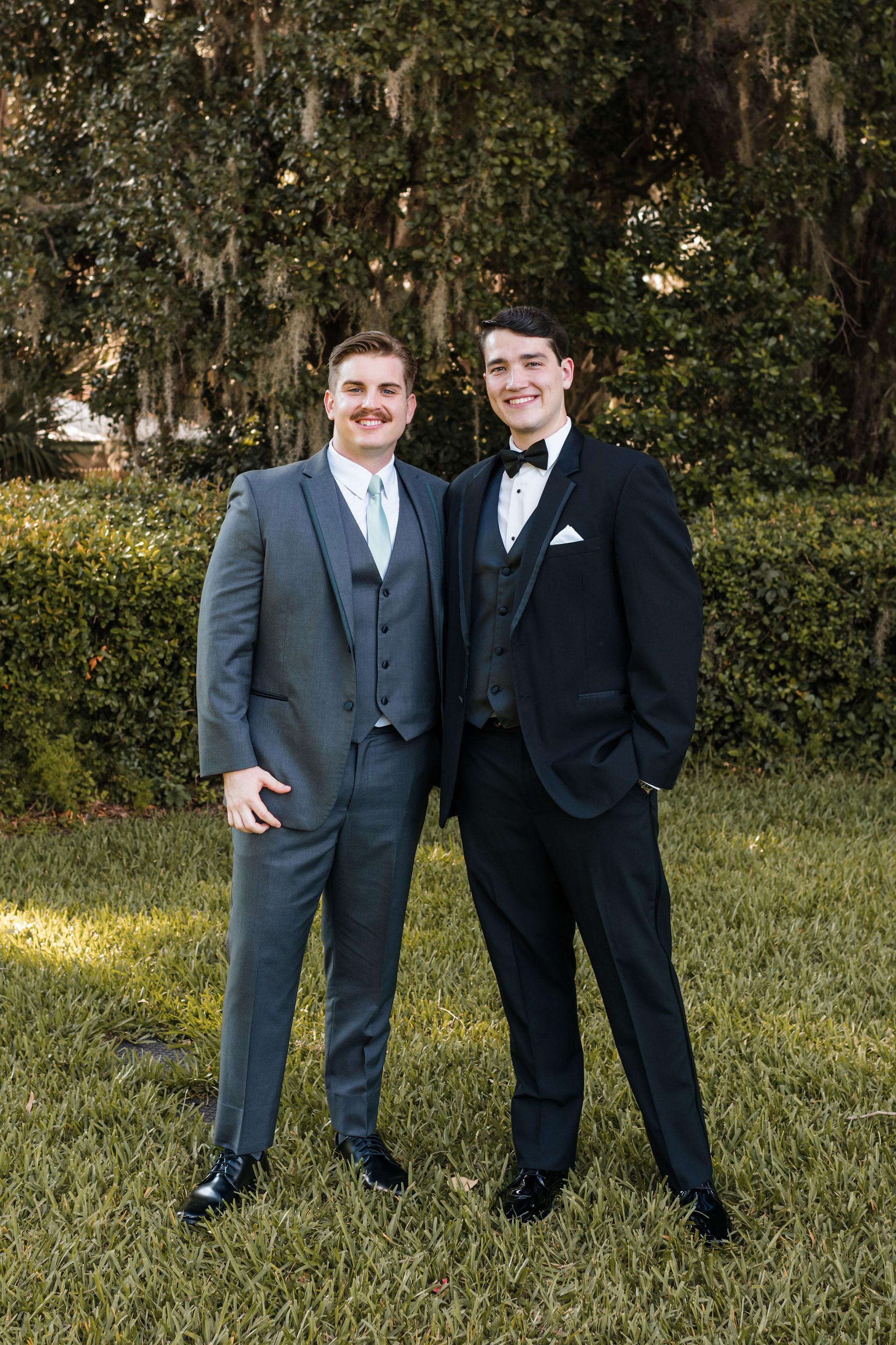 Evan as a groomsman in Ben Du…