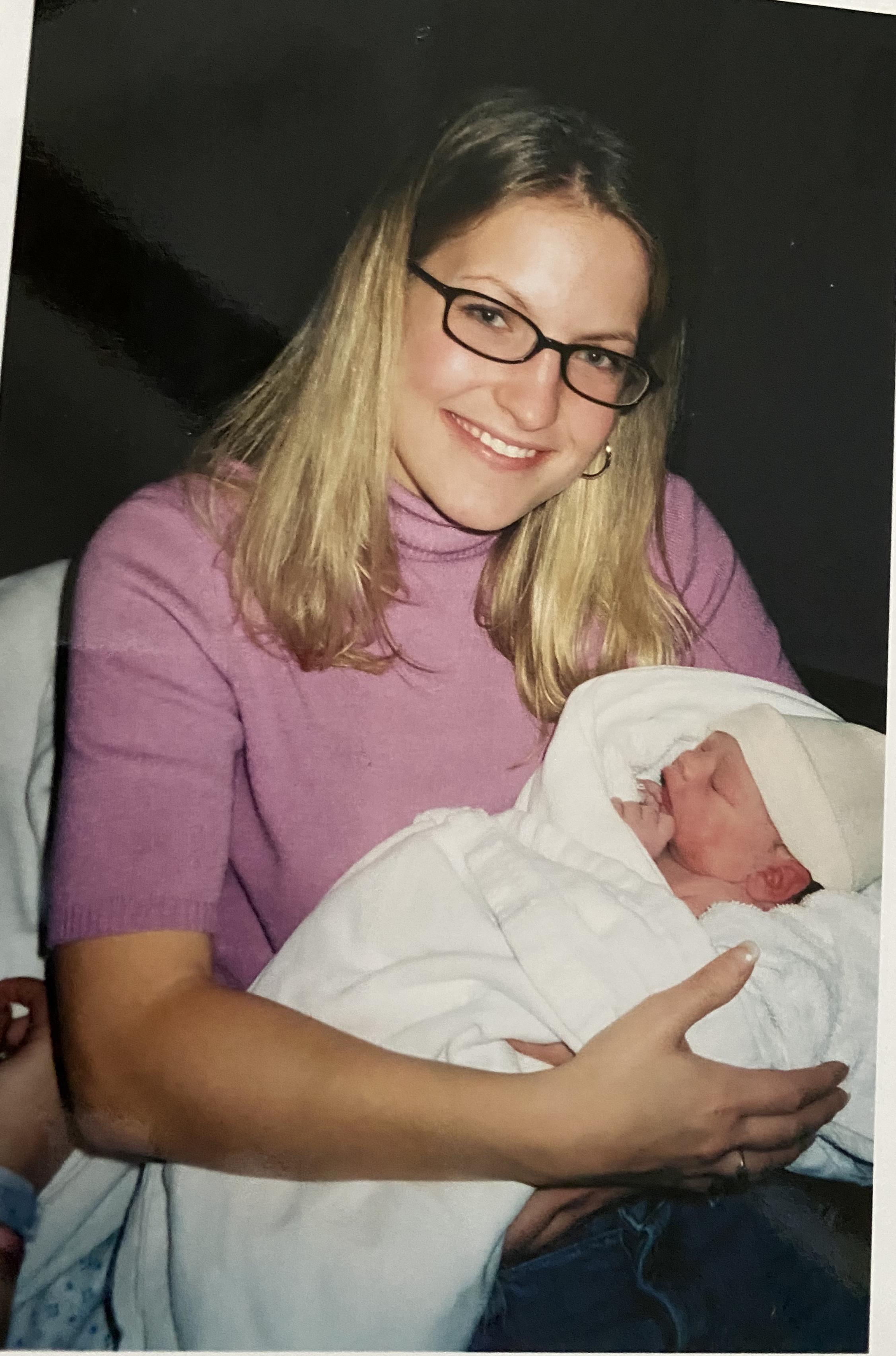 Holding newly born Parker on …