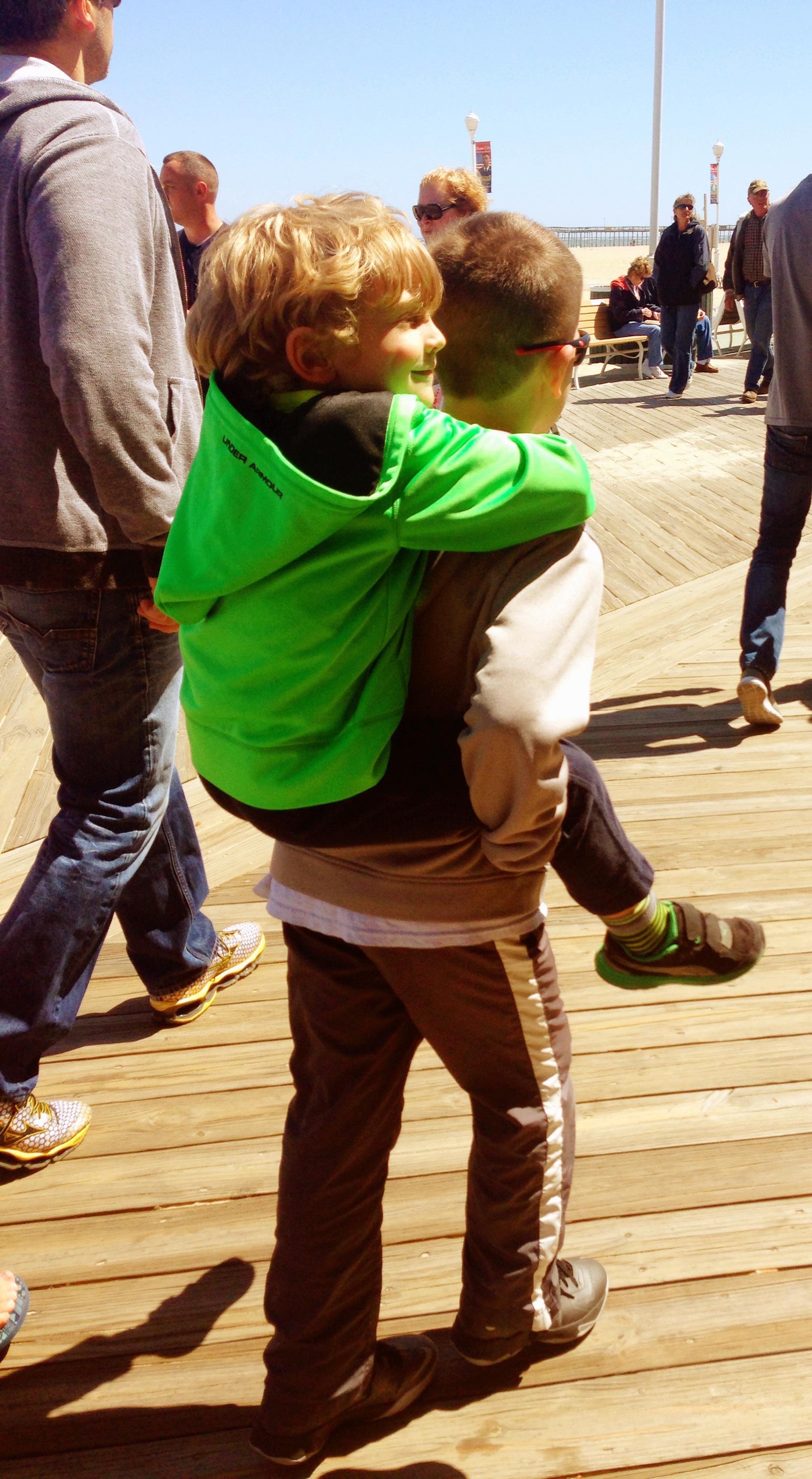 Parker giving Chase a piggyba…