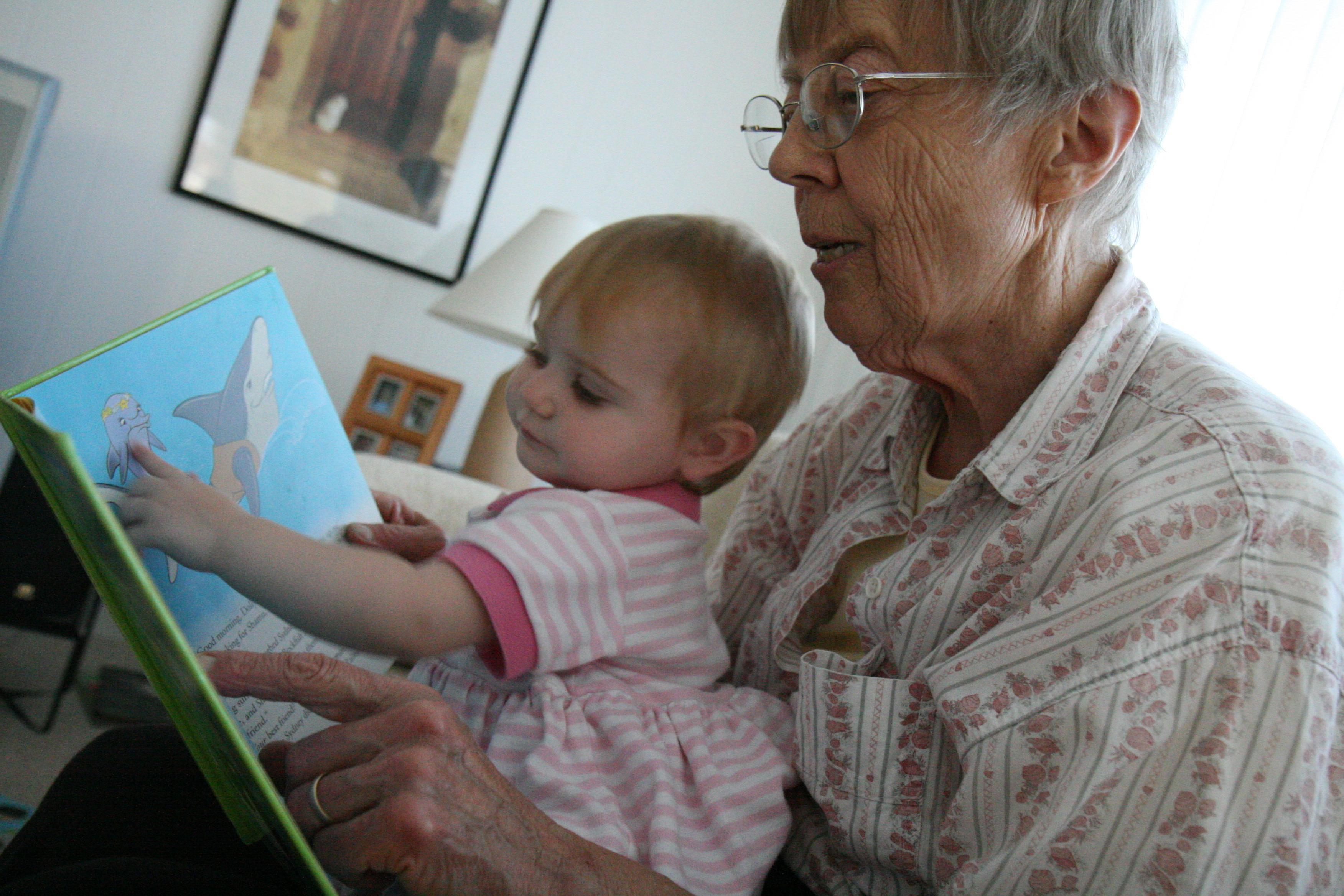 Reading to great-granddaughte…