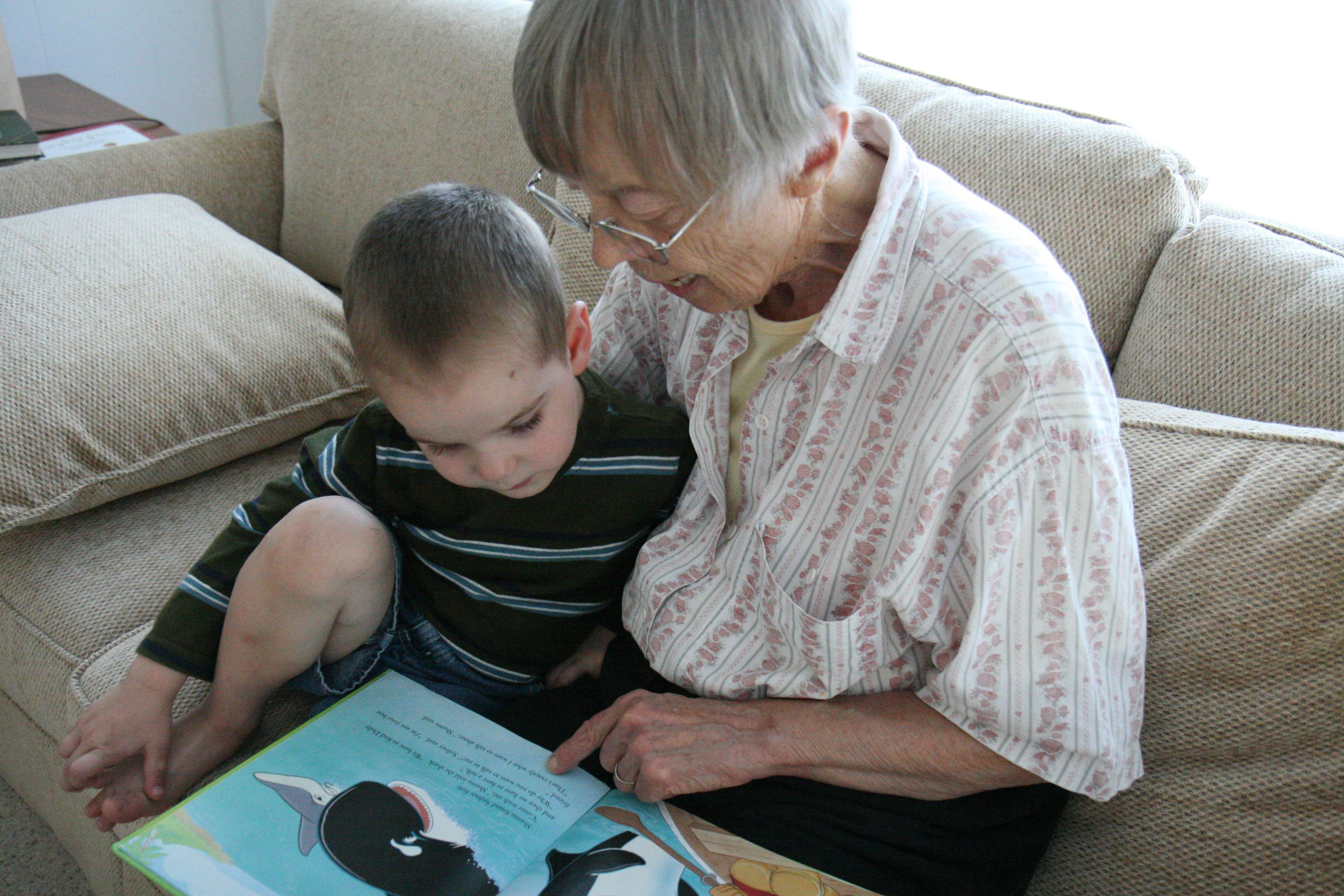 Reading to great-grandson Hay…