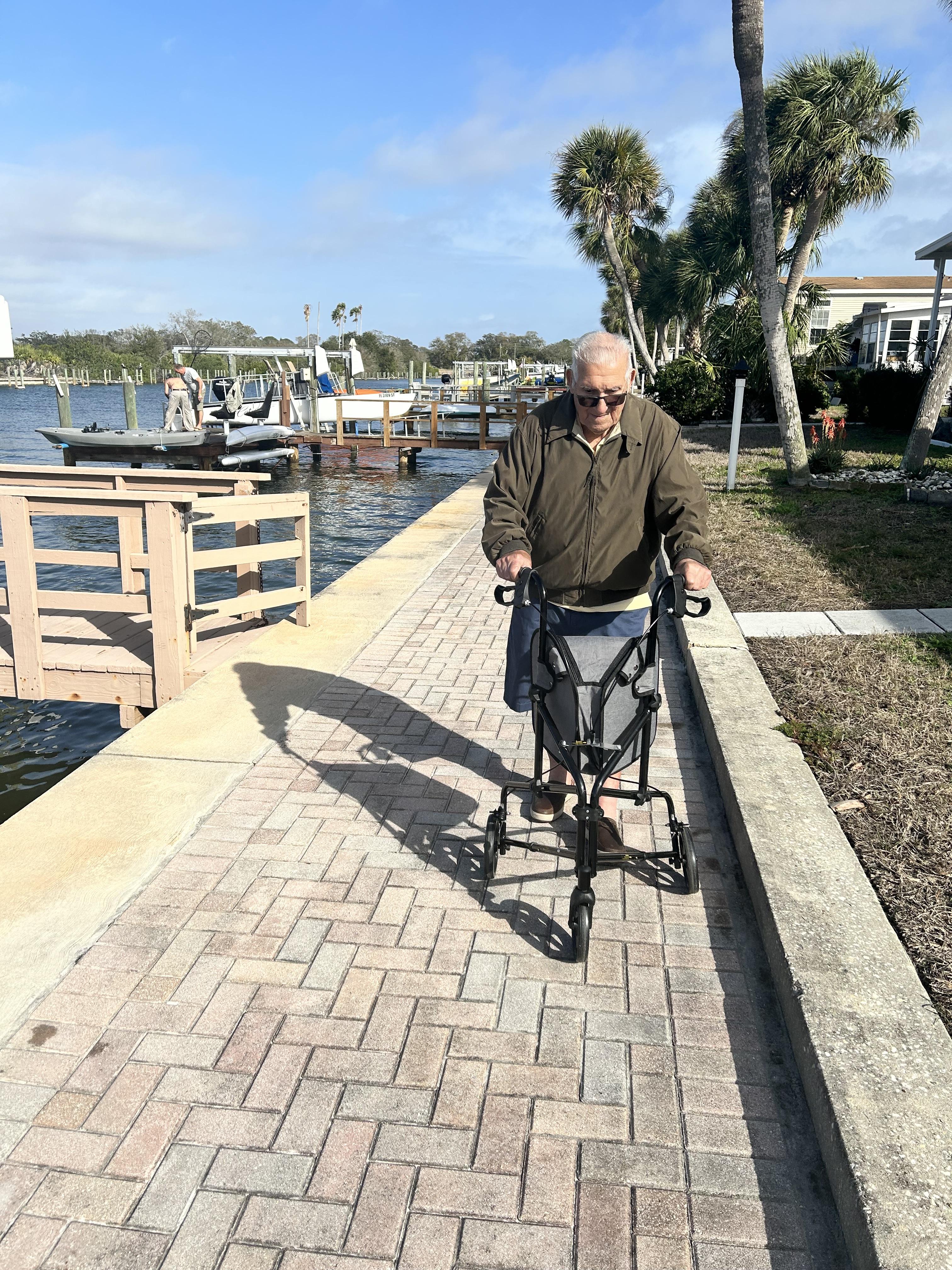Enjoying a stroll with his ne…