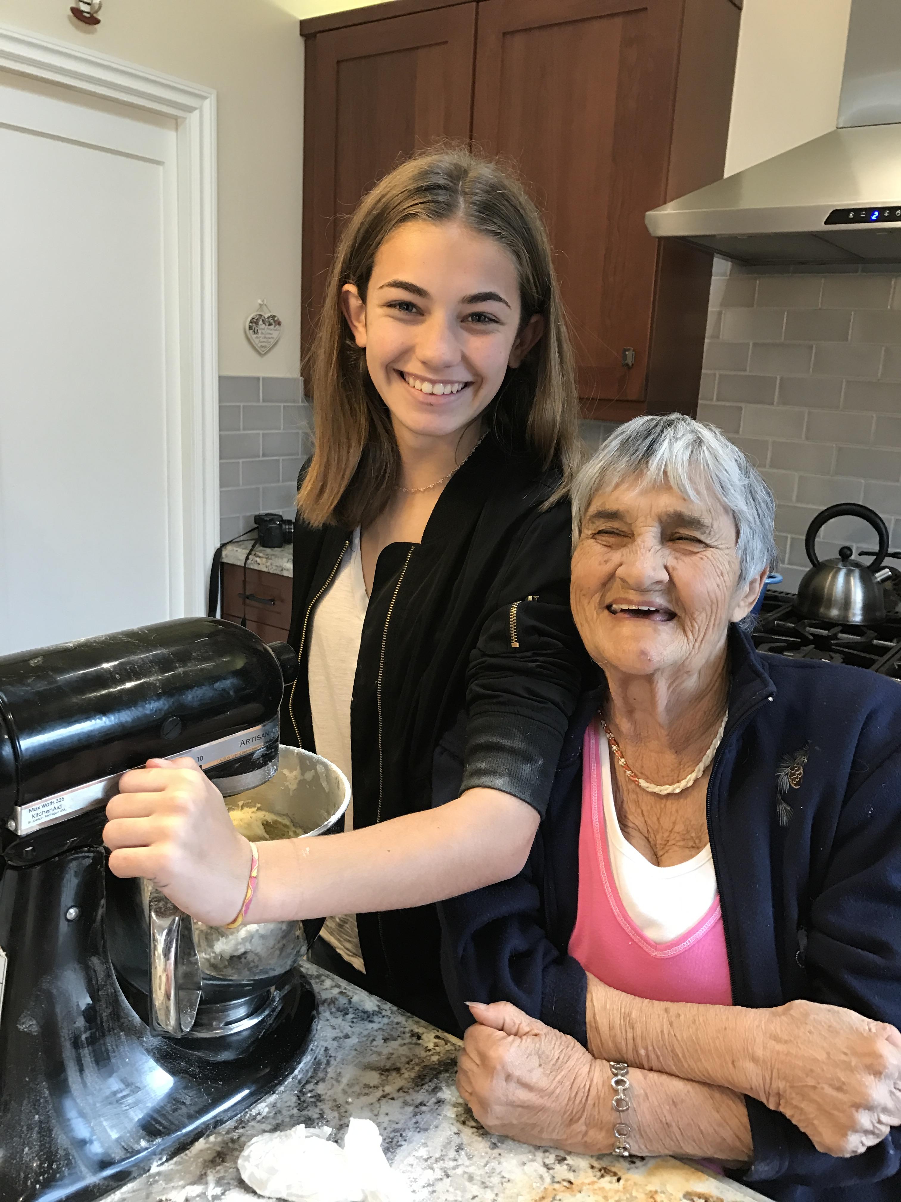 Bridget getting baking lesson…