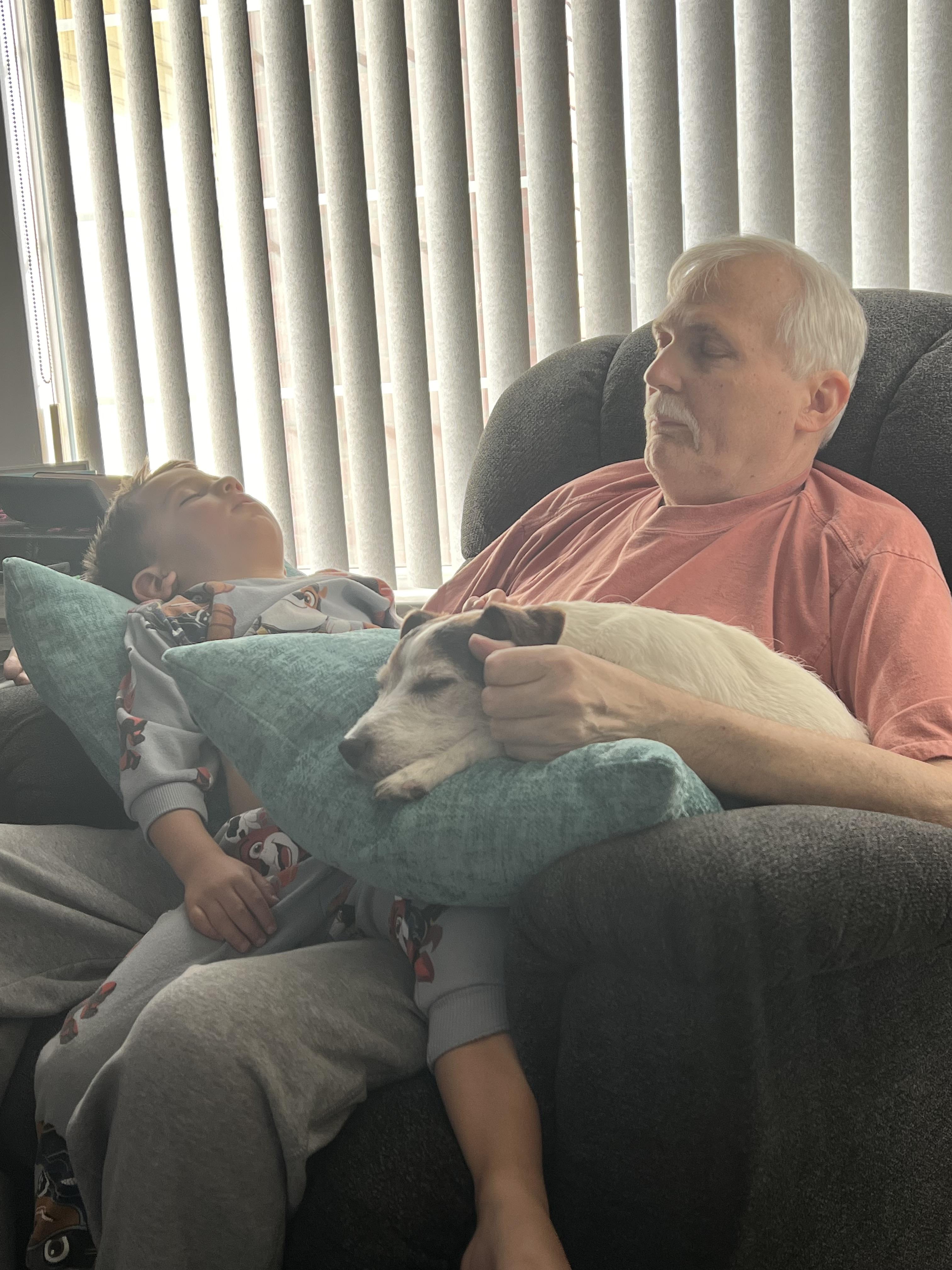Nap time with Grandpa, Miles,…