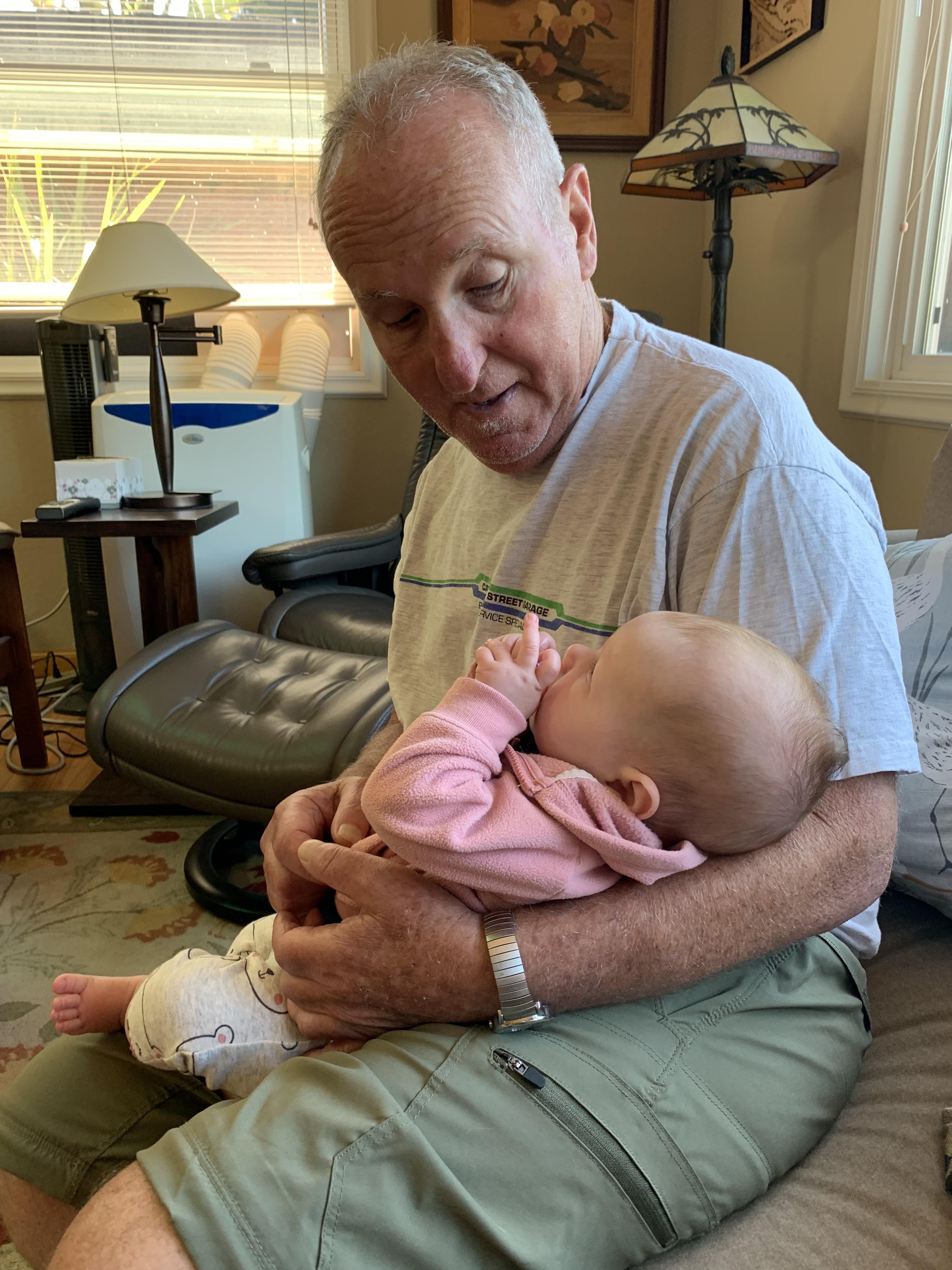 Dad holding baby Abigail