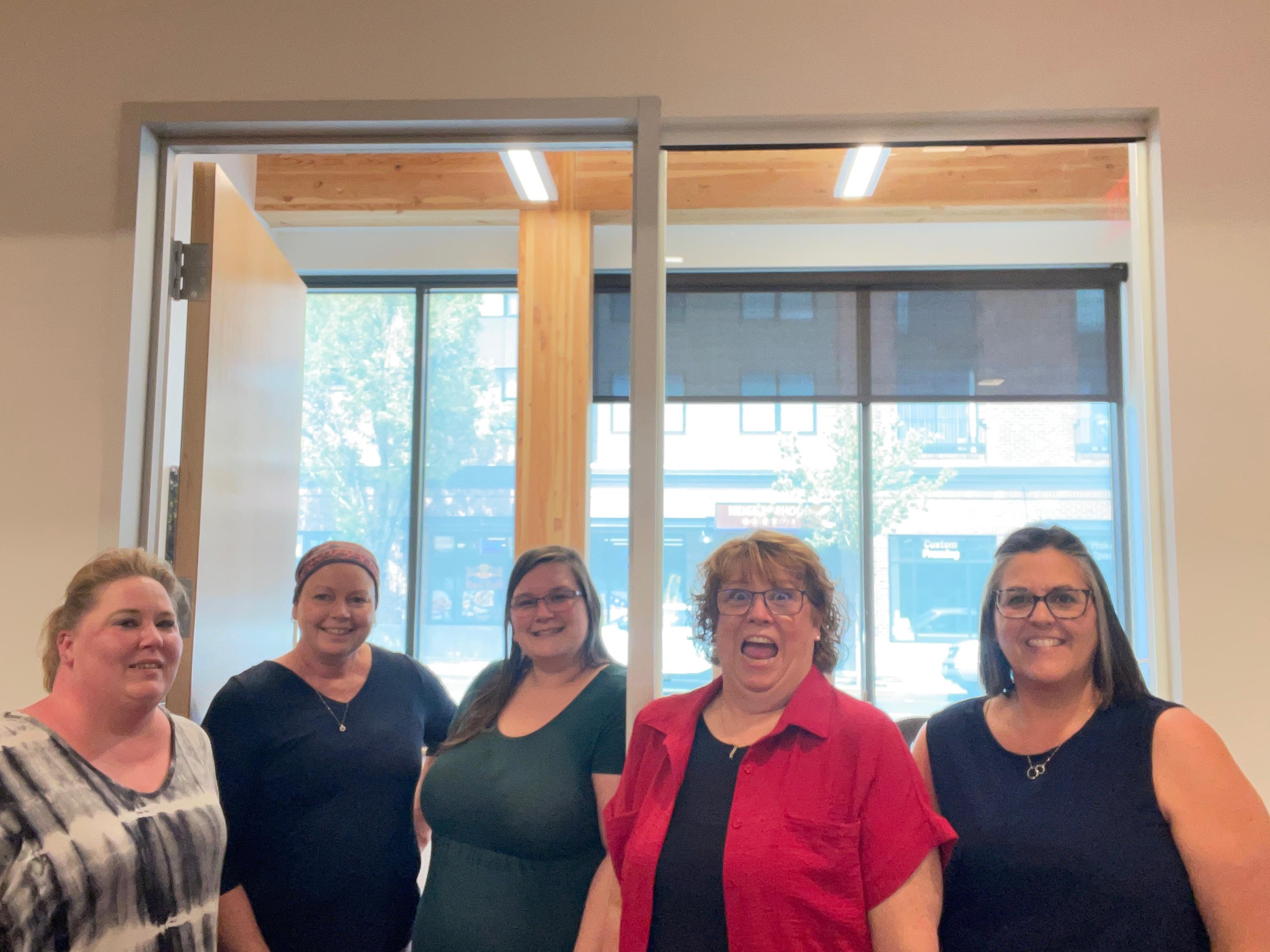 Susie with her coworkers. She…