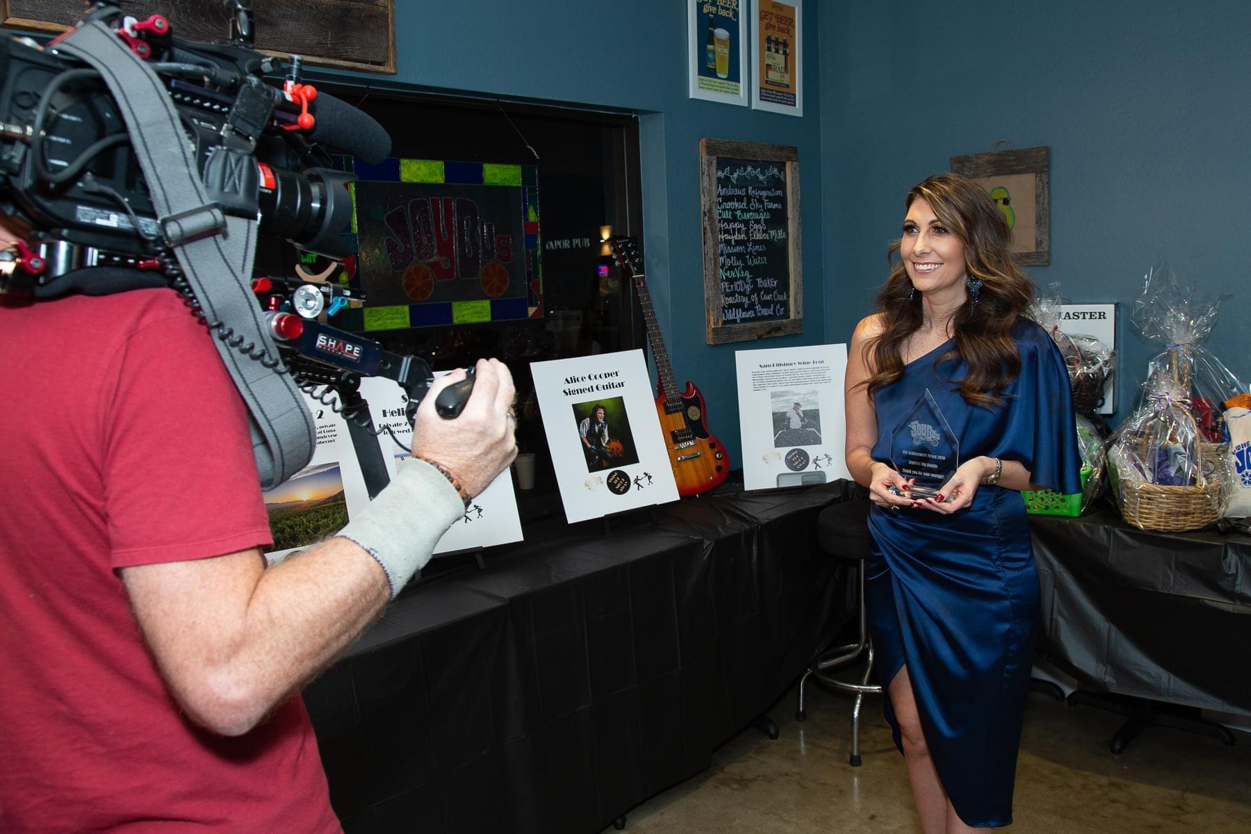 Jennifer receiving The Joy Bu…