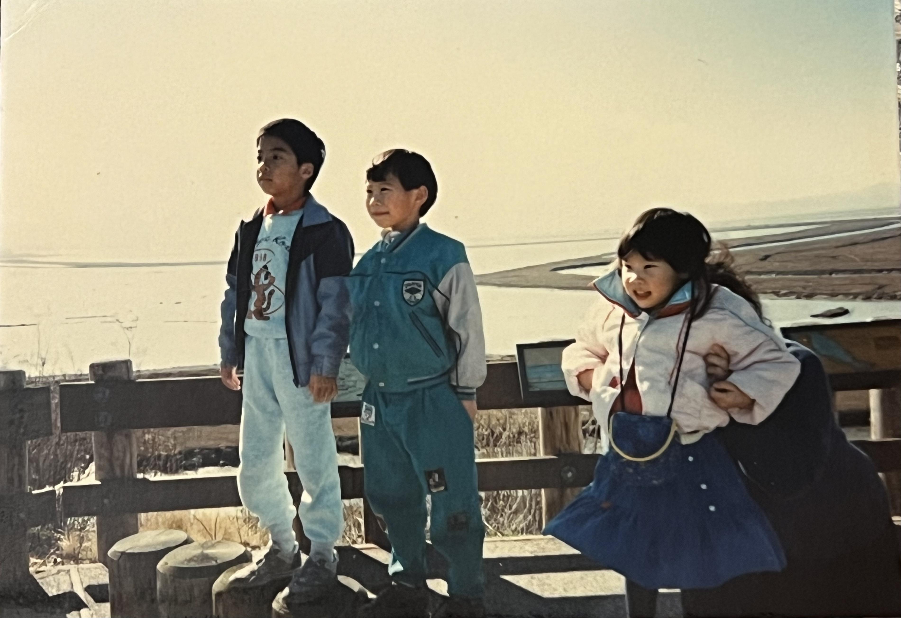 Jason, with cousins Min Wei a…