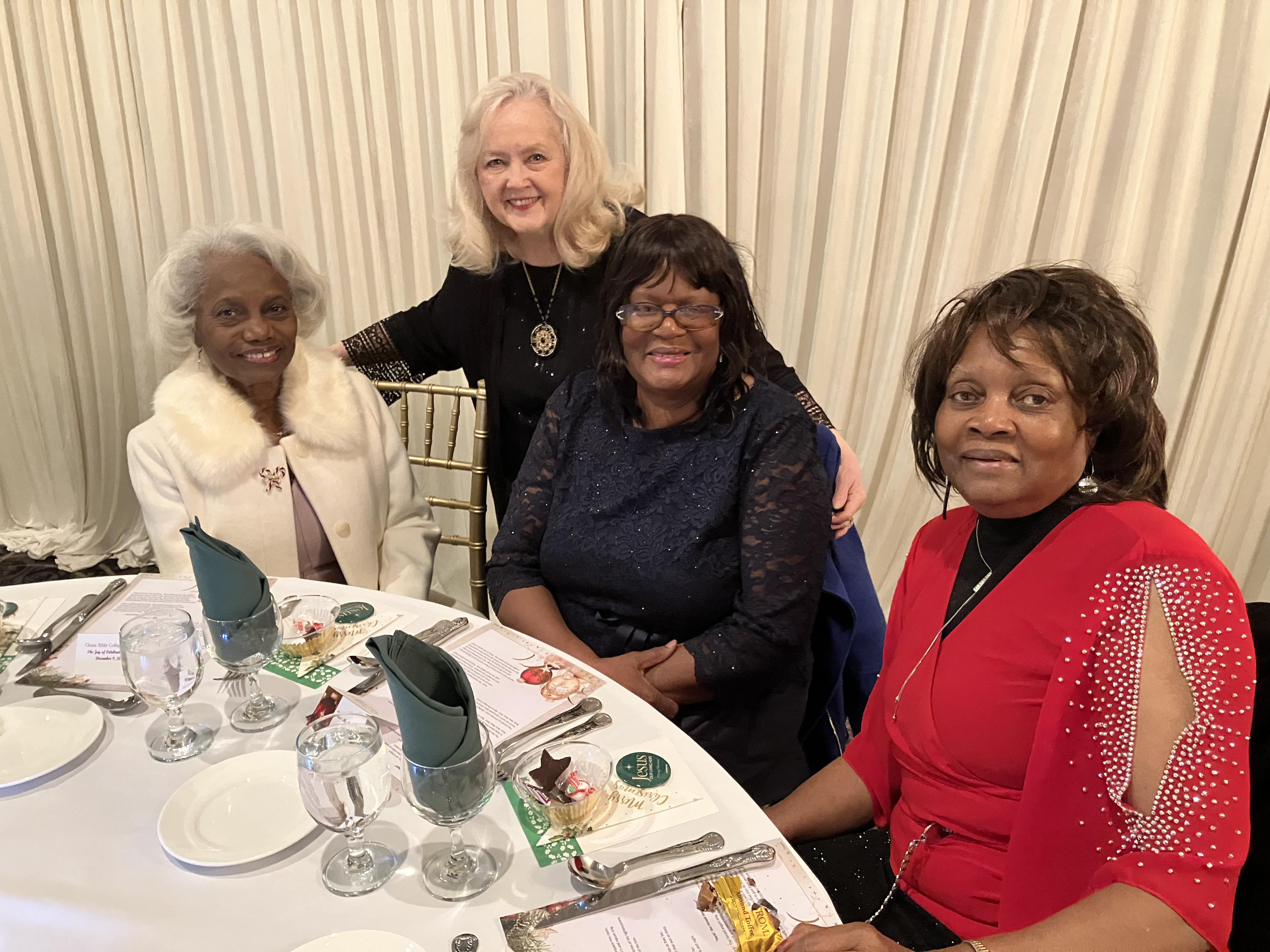 Christine and fellow Alumni