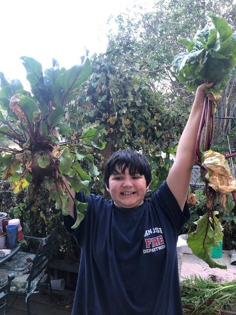 Ben with prize beets.  Actual…