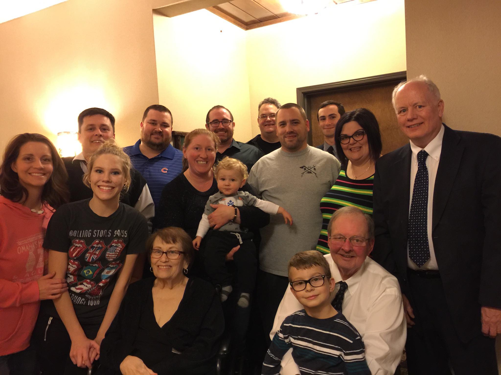 Mom and Dad with kids and gra…