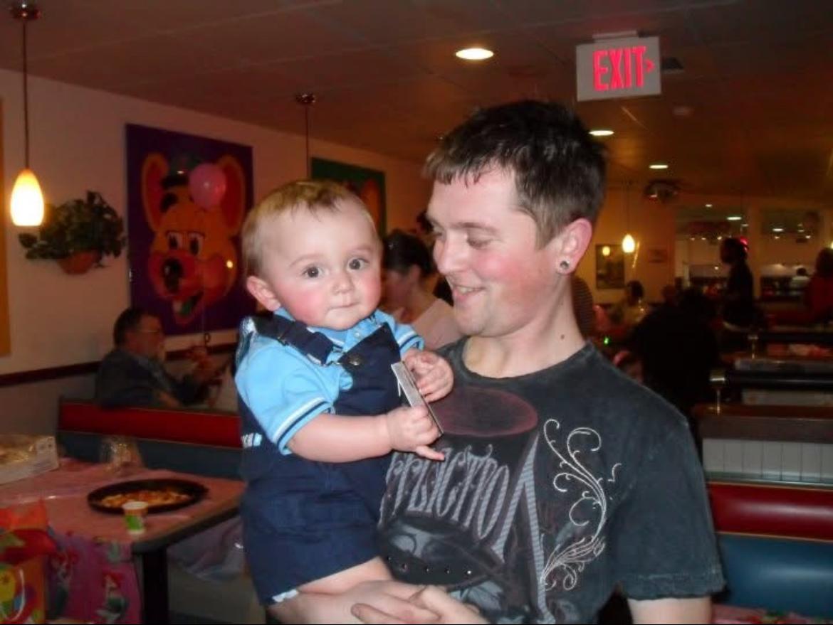 Brandon and baby Kai at Chuck…