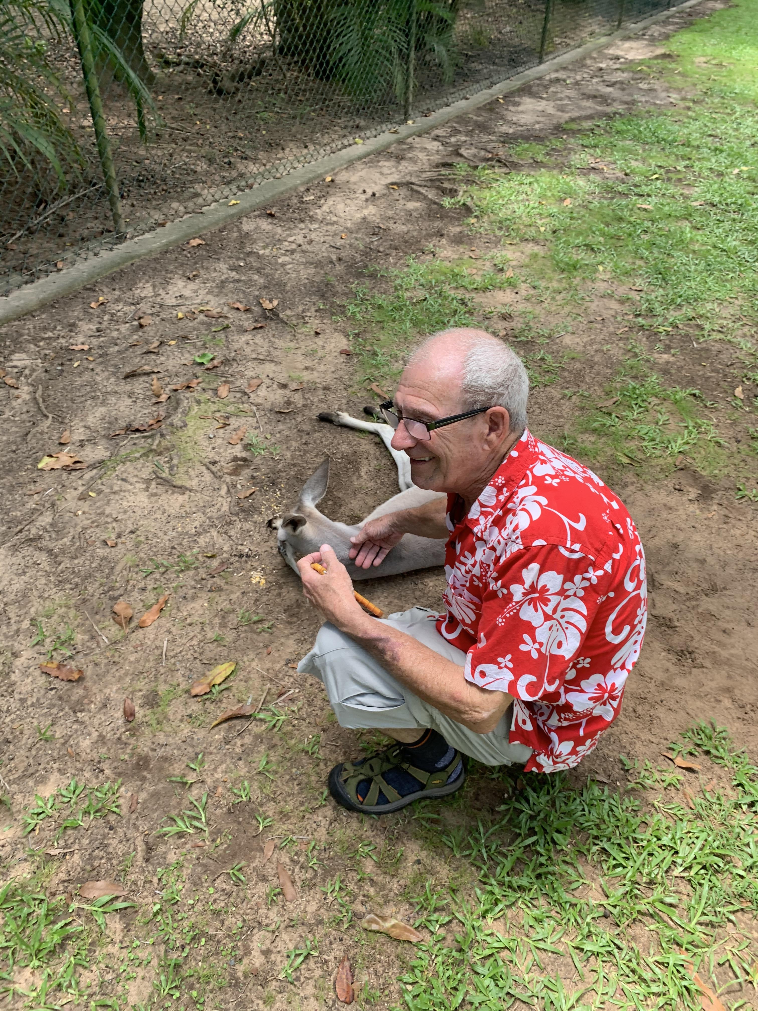 Grandpa Mike petting a kangar…