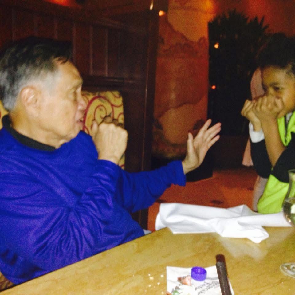 Papa playing with his grandso…