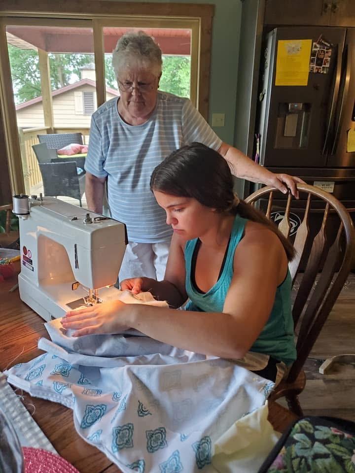 Helping Samantha with a 4-H p…