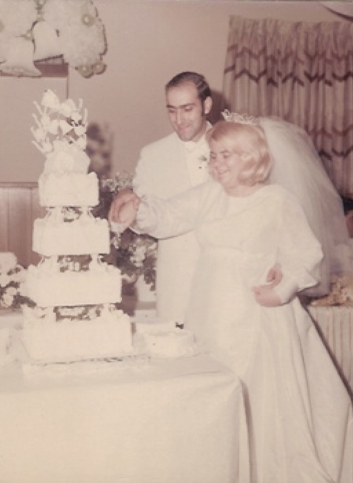 Mary & Frank cutting wedd…
