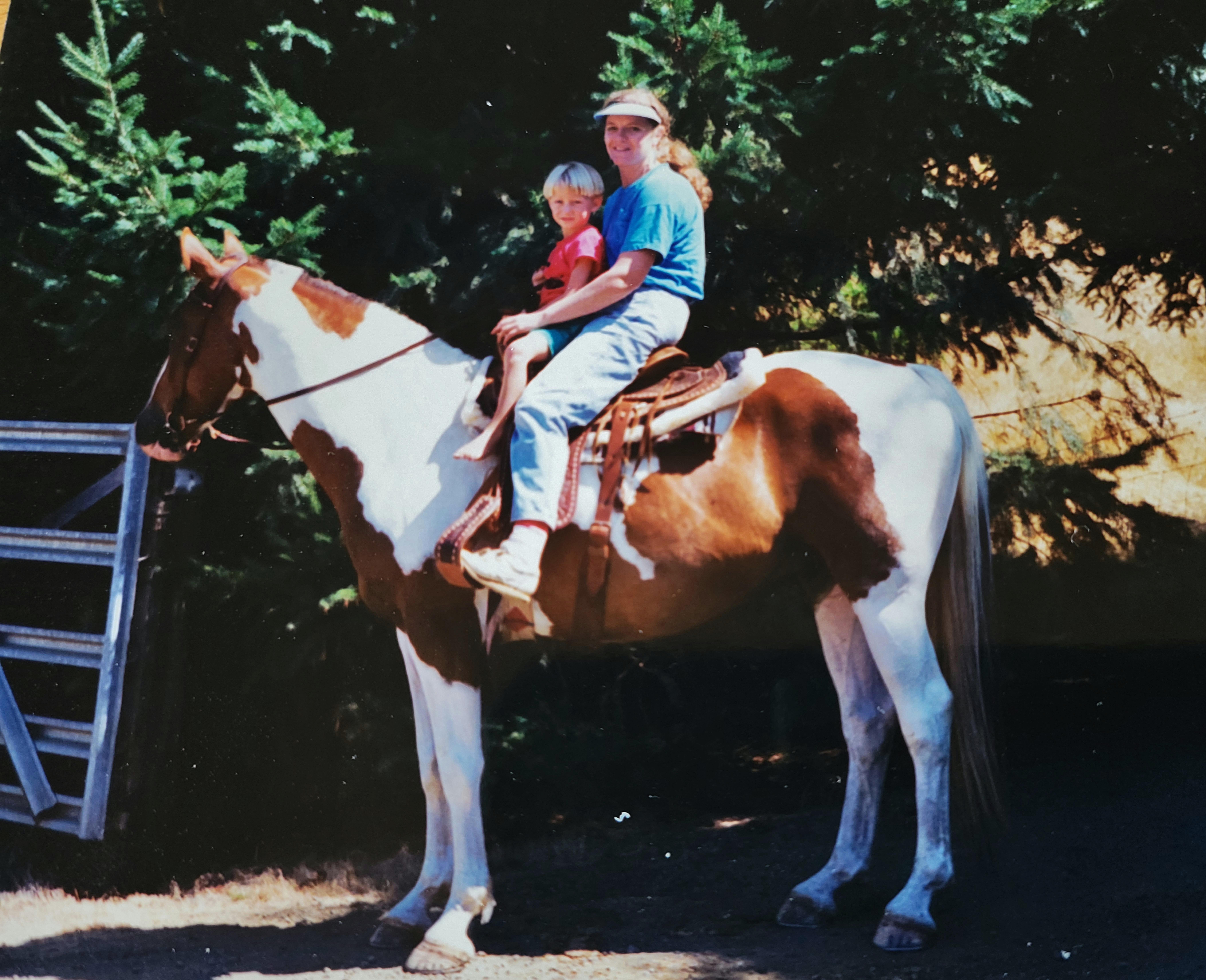 Aunt Marcia with Ian riding D…