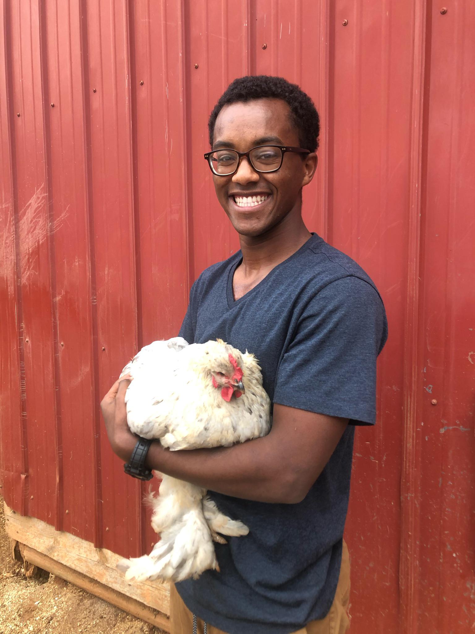 Ket holding our favorite hen,…