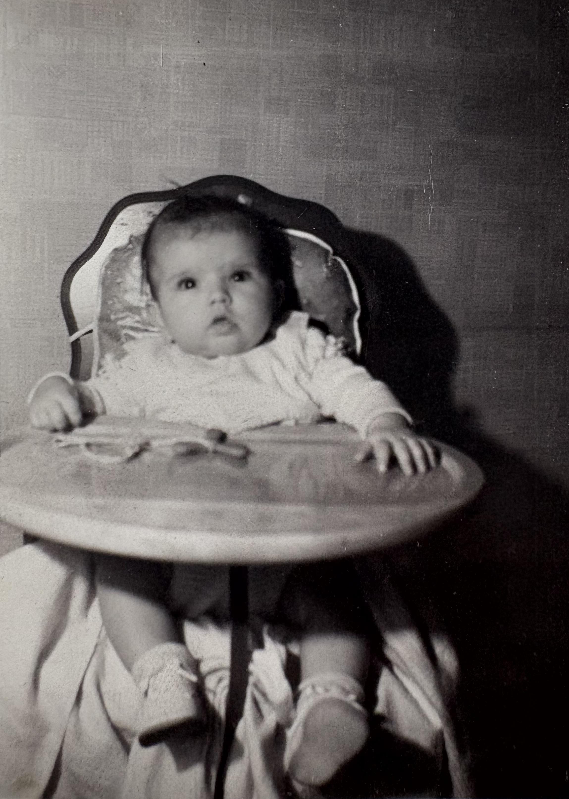 Baby Bonnie in her highchair,…
