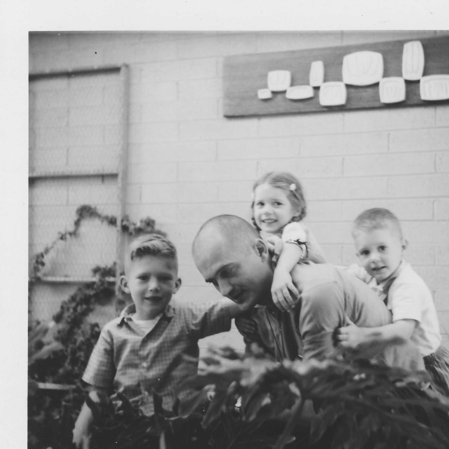 Frank with his children, Tom,…
