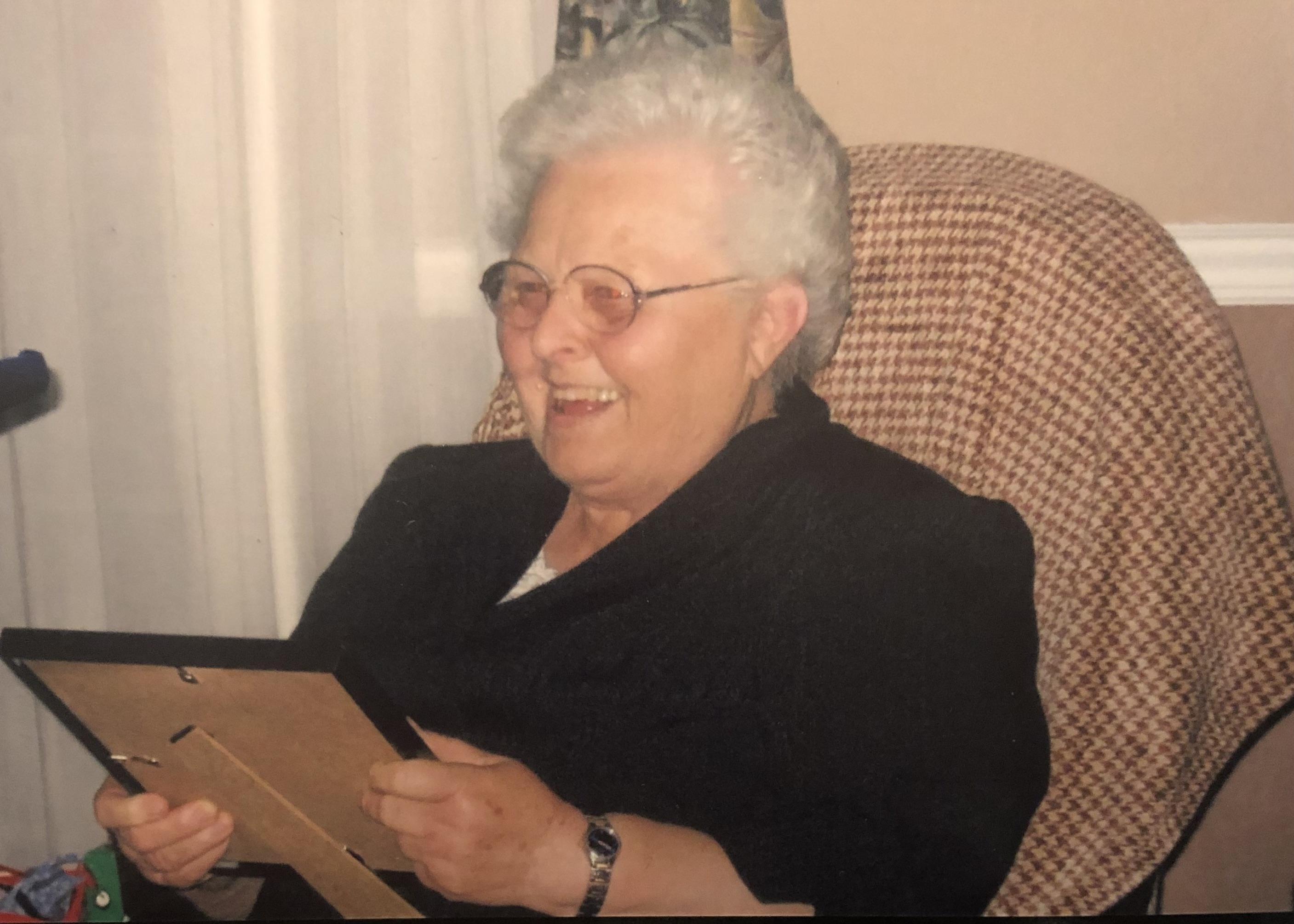 Doris opening Christmas gift
