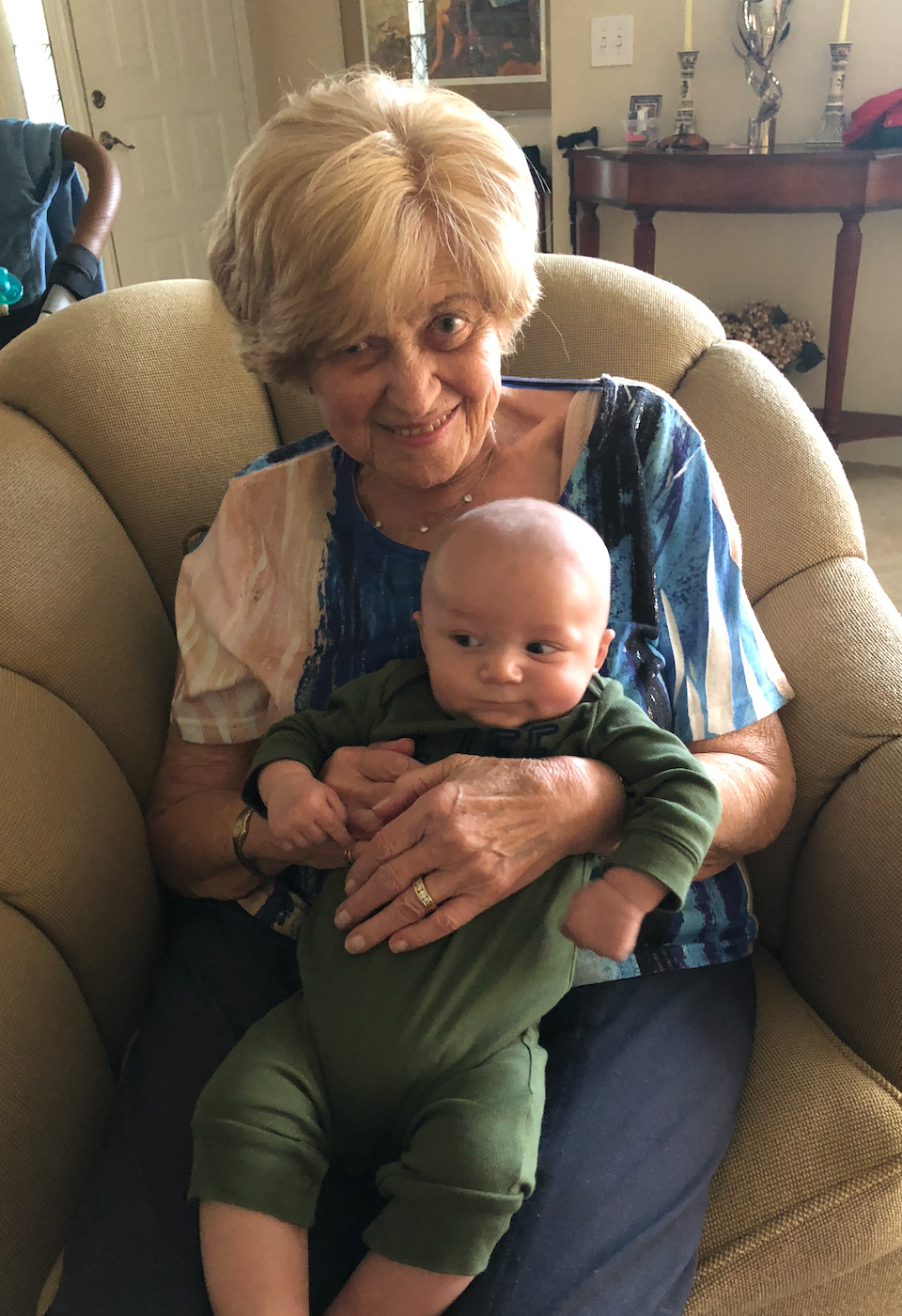 Nana holding her great grands…