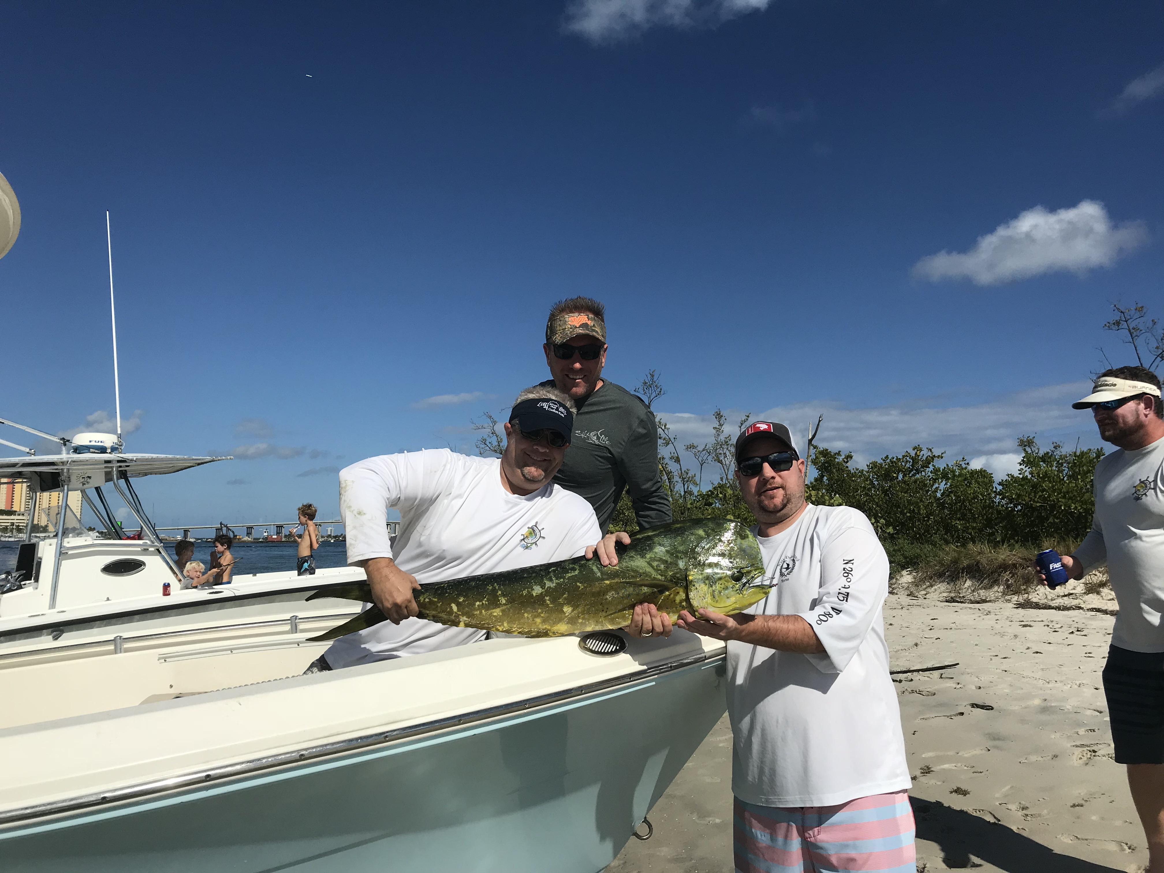 Chris’s first dolphin. One of…