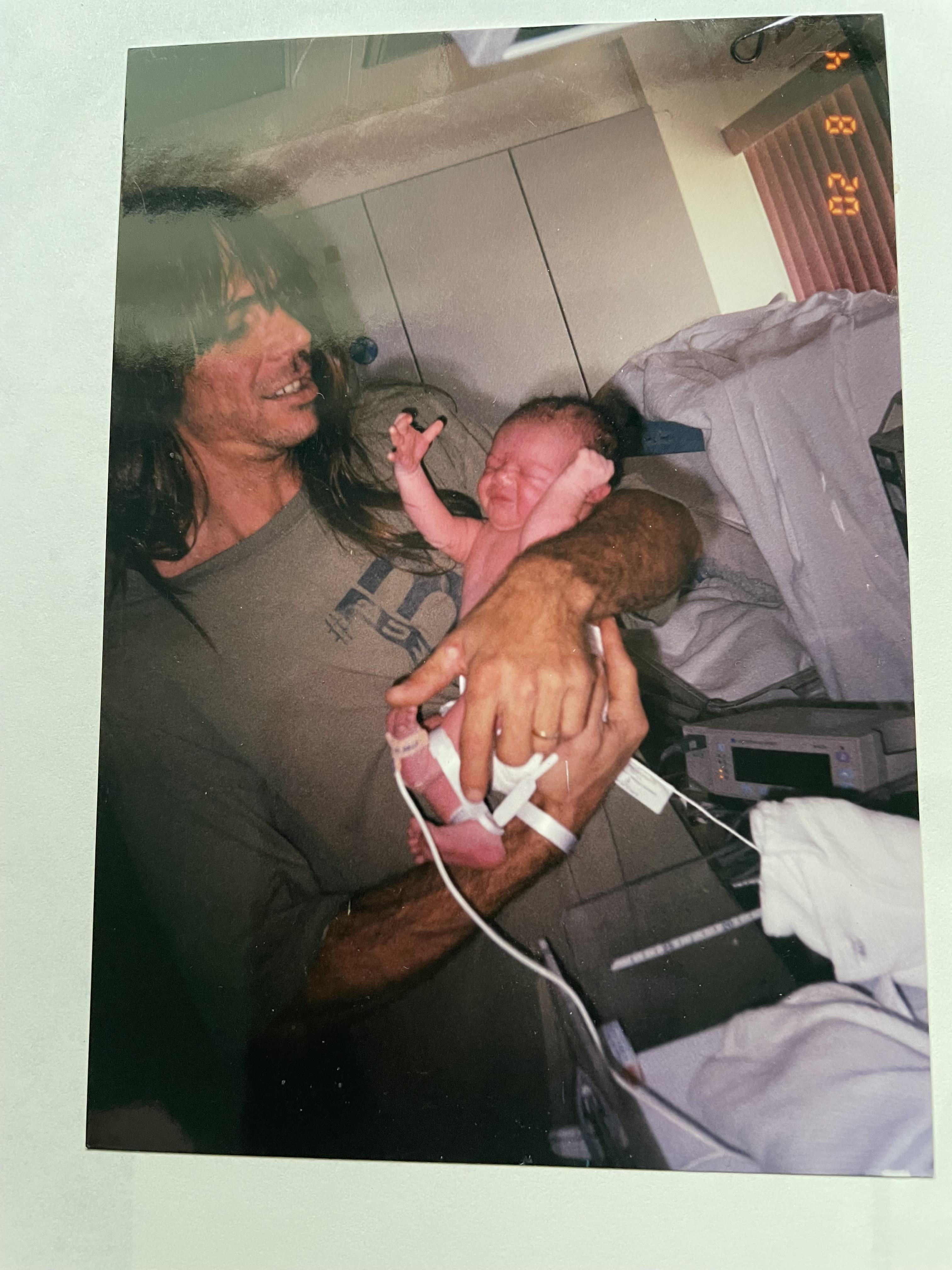 Dale holding Gillian on her b…