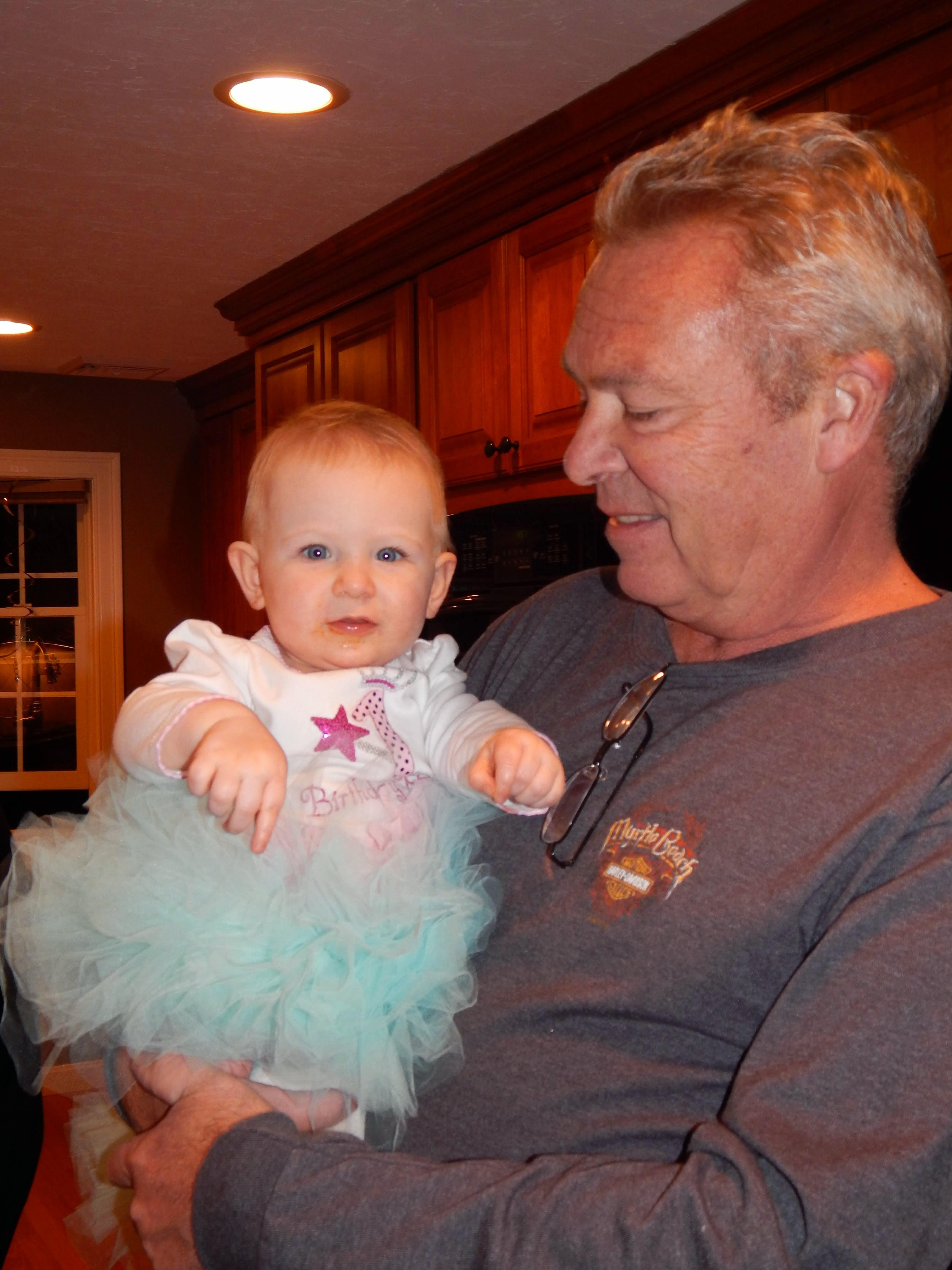 Uncle Jim with Molly on her 1…