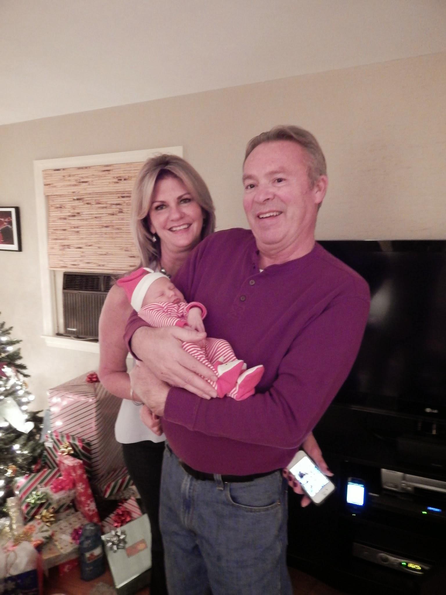 Uncle Jim holding his grand-n…