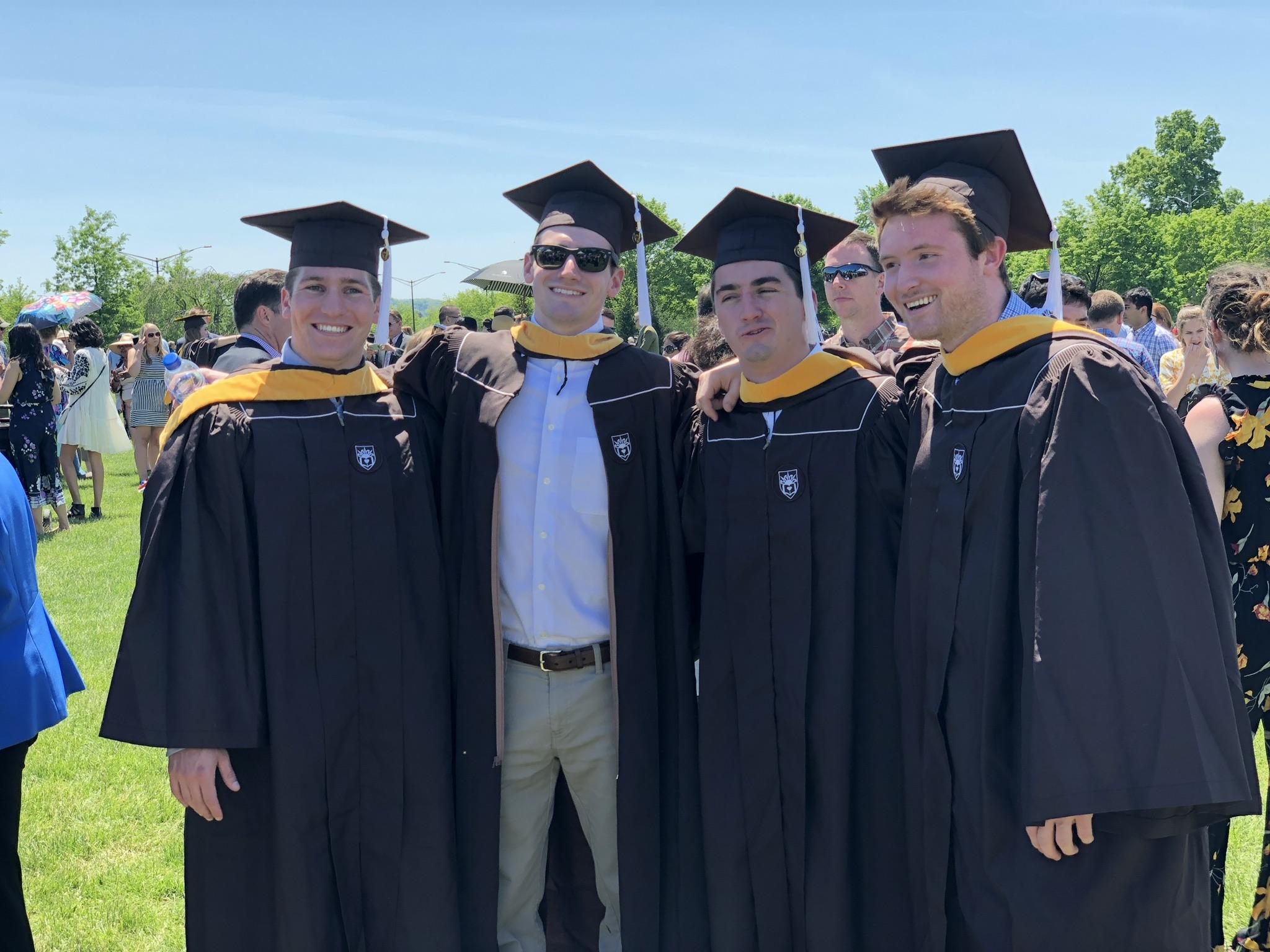 Sam at graduation with his ho…