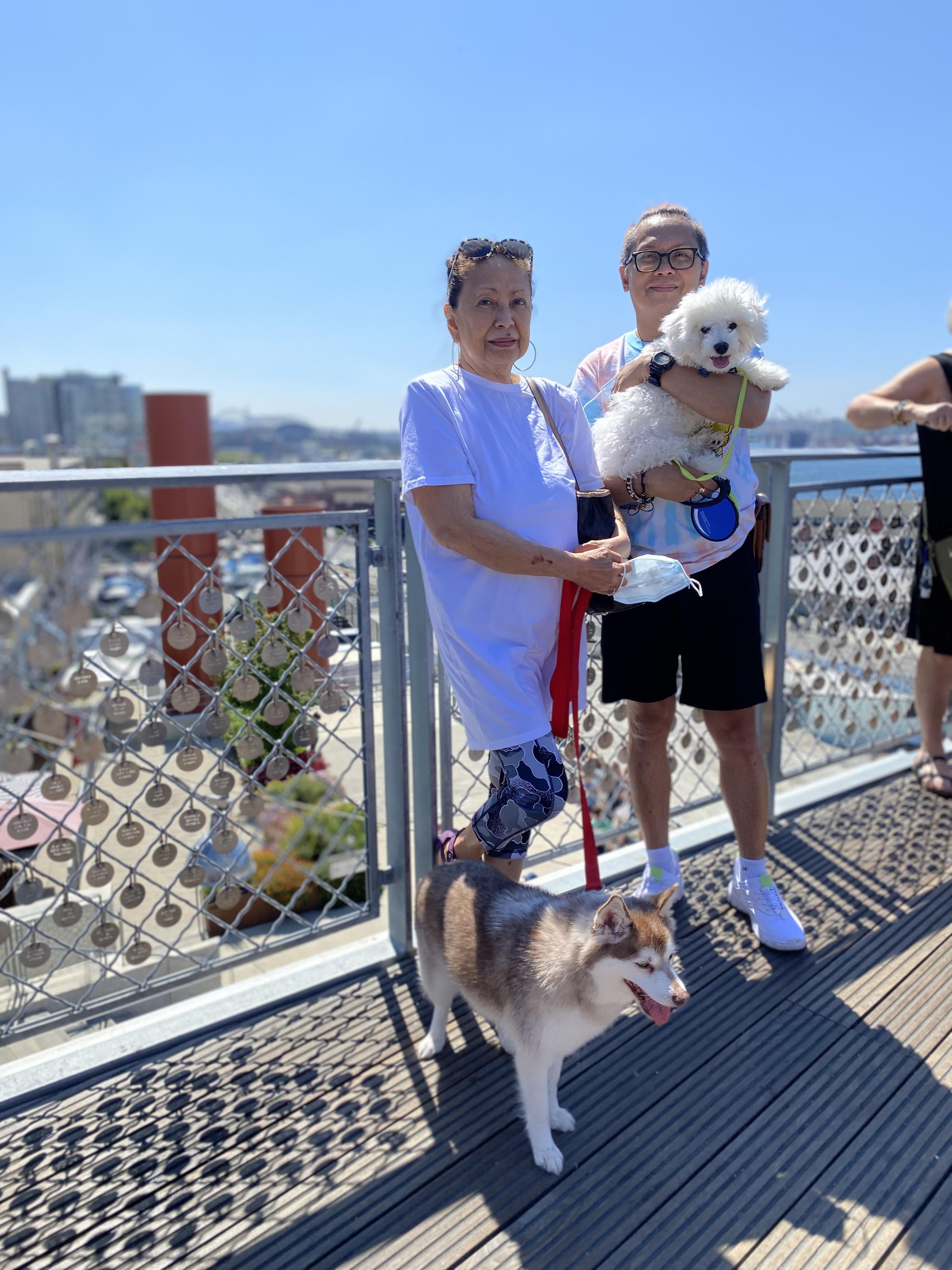 Jeune with mom and their dog