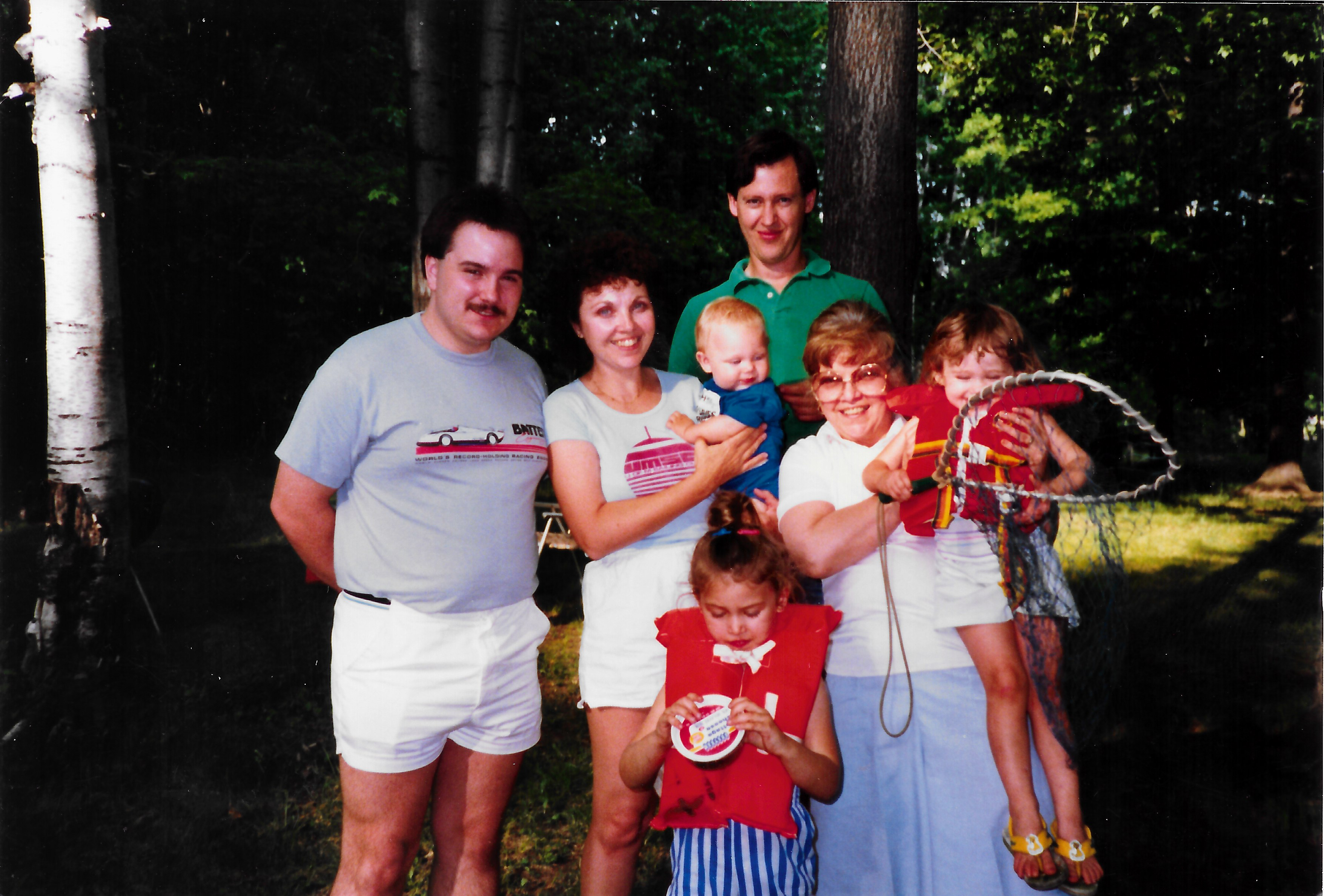 Karen (center) with children,…
